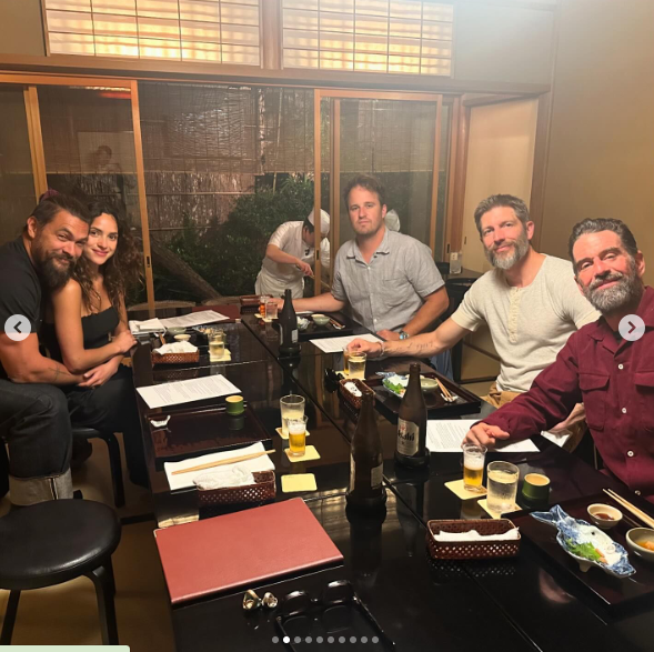 Jason Momoa, Adria Arjona, and friends posing for a photo, posted on May 20, 2024. | Source: Instagram/prideofgypsies