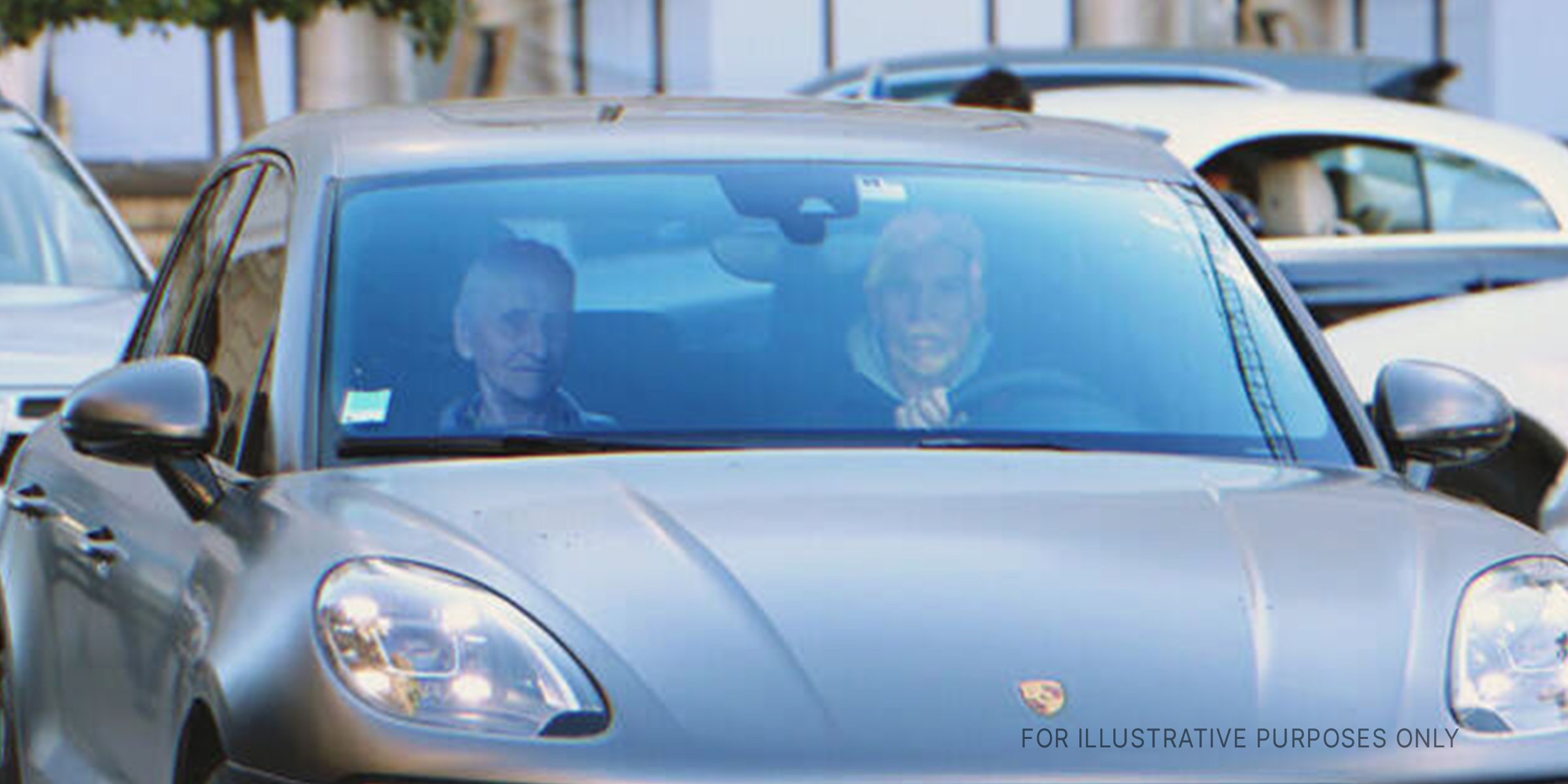 Two man driving a sports car | Source: Shutterstock
