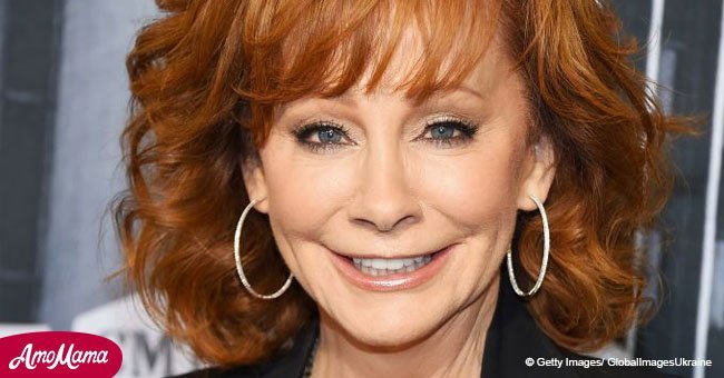 Reba McEntire, 63, puts on a dazzling display as she flaunts her body in a plunging velvet gown
