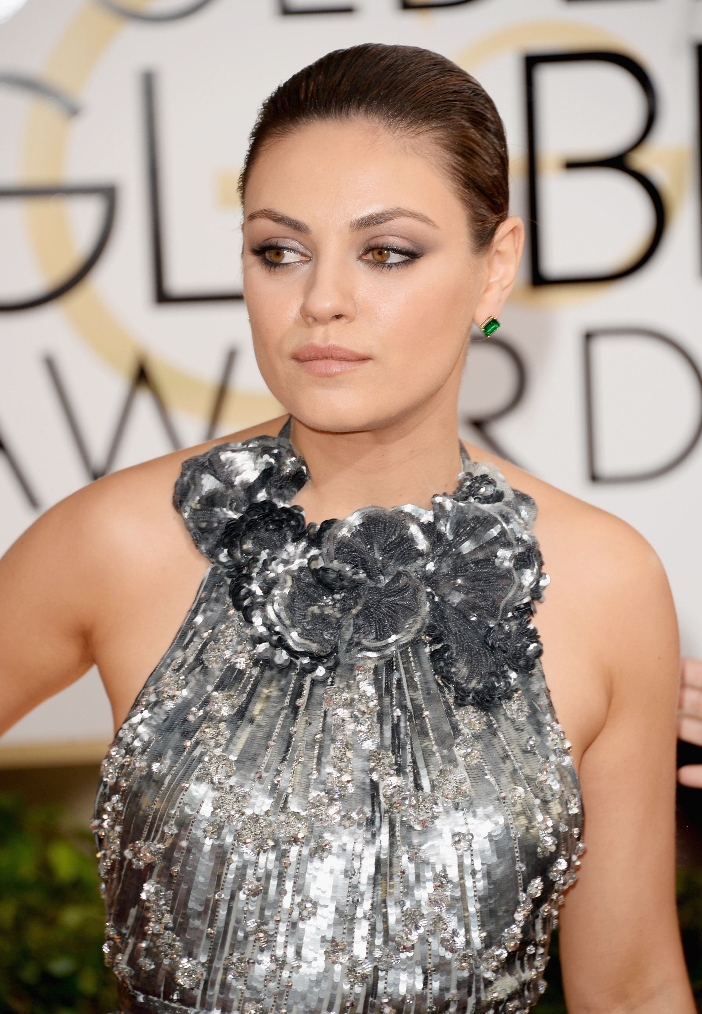 Mila Kunis at the 71st Annual Golden Globe Awards on January 12, 2014, in Beverly Hills, California. | Source: Jason Merritt/Getty Images