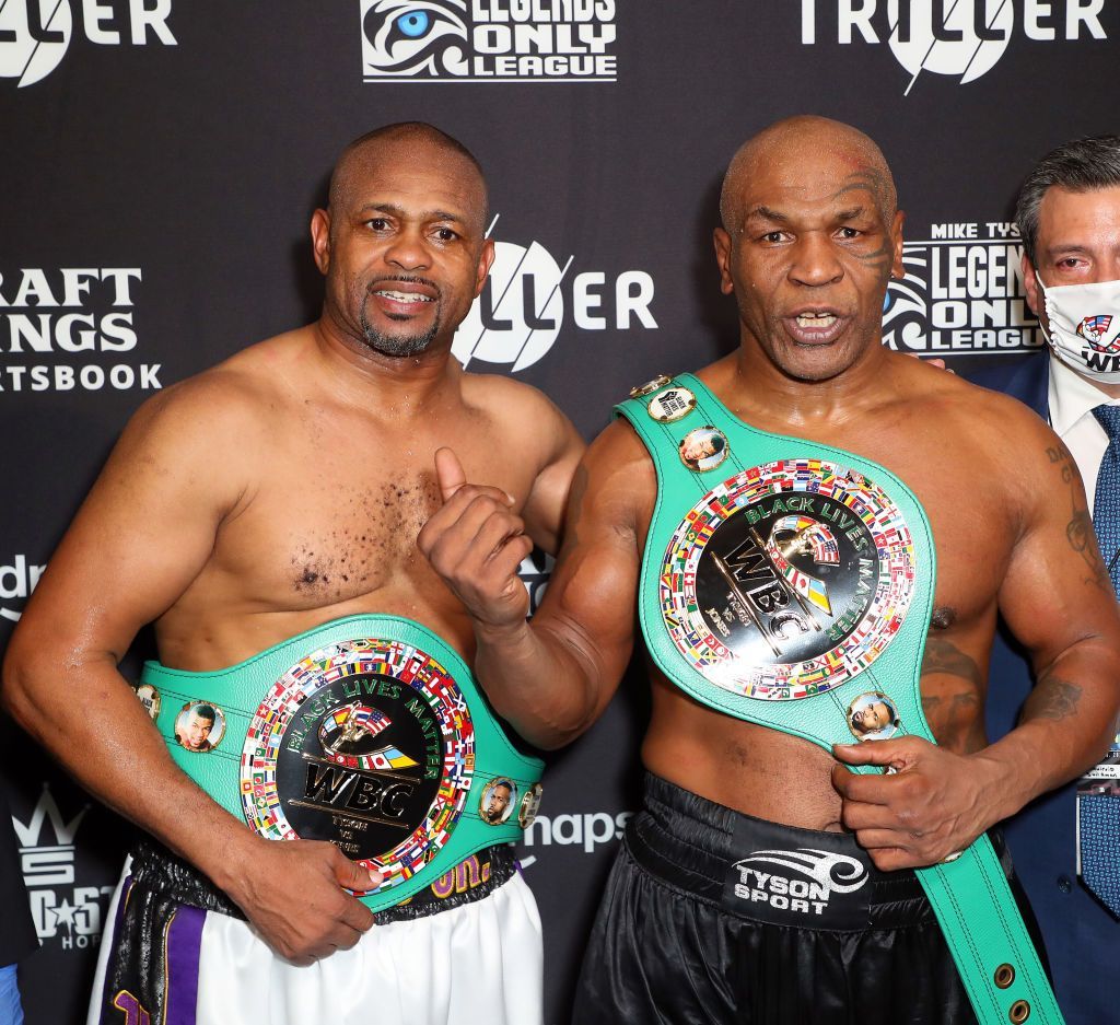 Roy Jones Jr and Mike Tyson after their boxing match presented by Triller at Staples Center in Los Angeles, California | Photo: Joe Scarnici/Getty Images for Triller