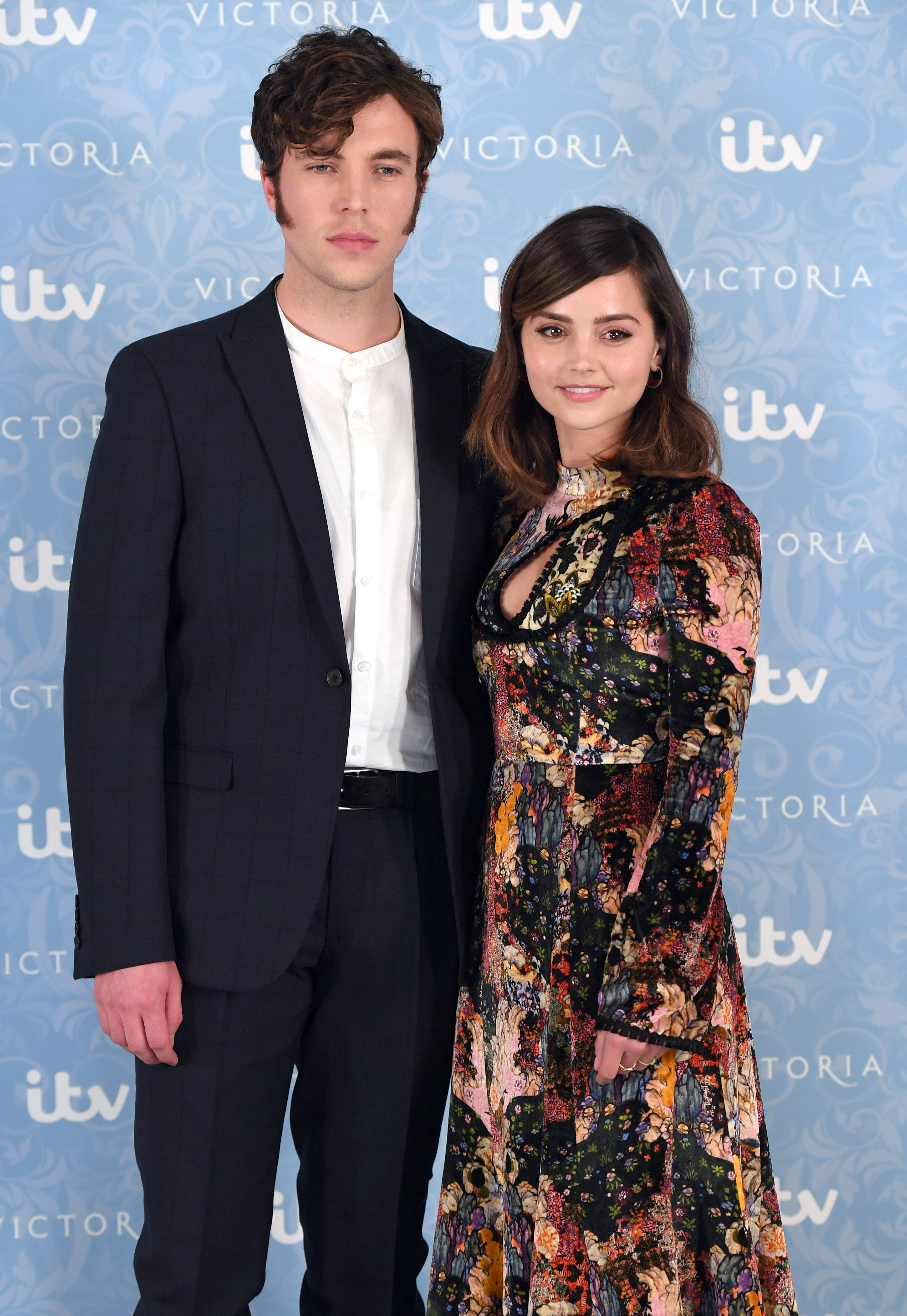 Tom Hughes and Jenna Coleman at the "Victoria" Season 2 Red Carpet Photocall on August 24, 2017 in London, England | Source: Getty Images