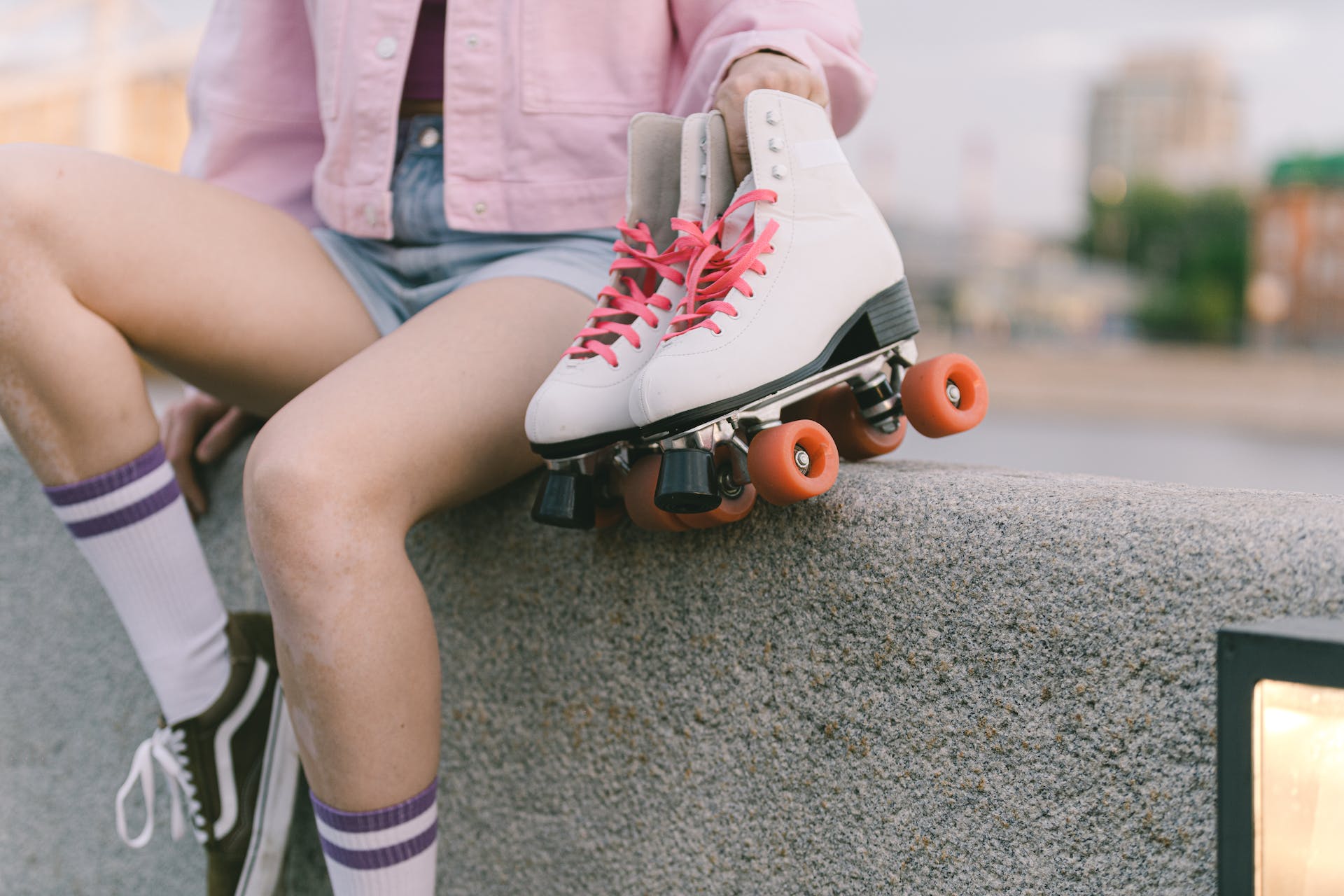 A person holding a pair of roller skates | Source: Pexels