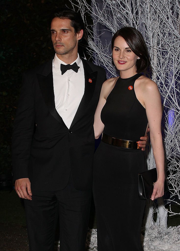 Michelle Dockery and boyfriend John Dineen at the Winter Whites Gala at Kensington Palace on November 26, 2013 | Photo: Getty Images