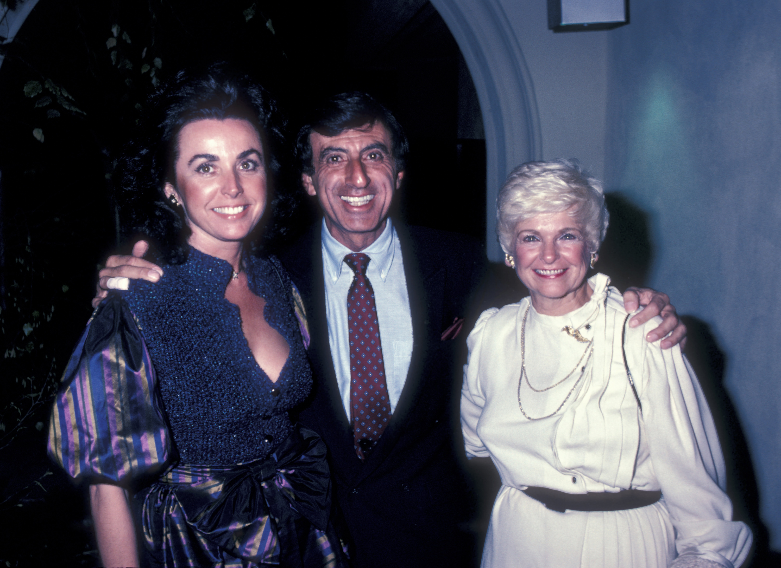 Jamie Farr, his wife Joy Richards and mother Jamelia Farah attend the grand opening of Santopietro Restaurant on January 21, 1983 in Calabasas, California | Source: Getty Images