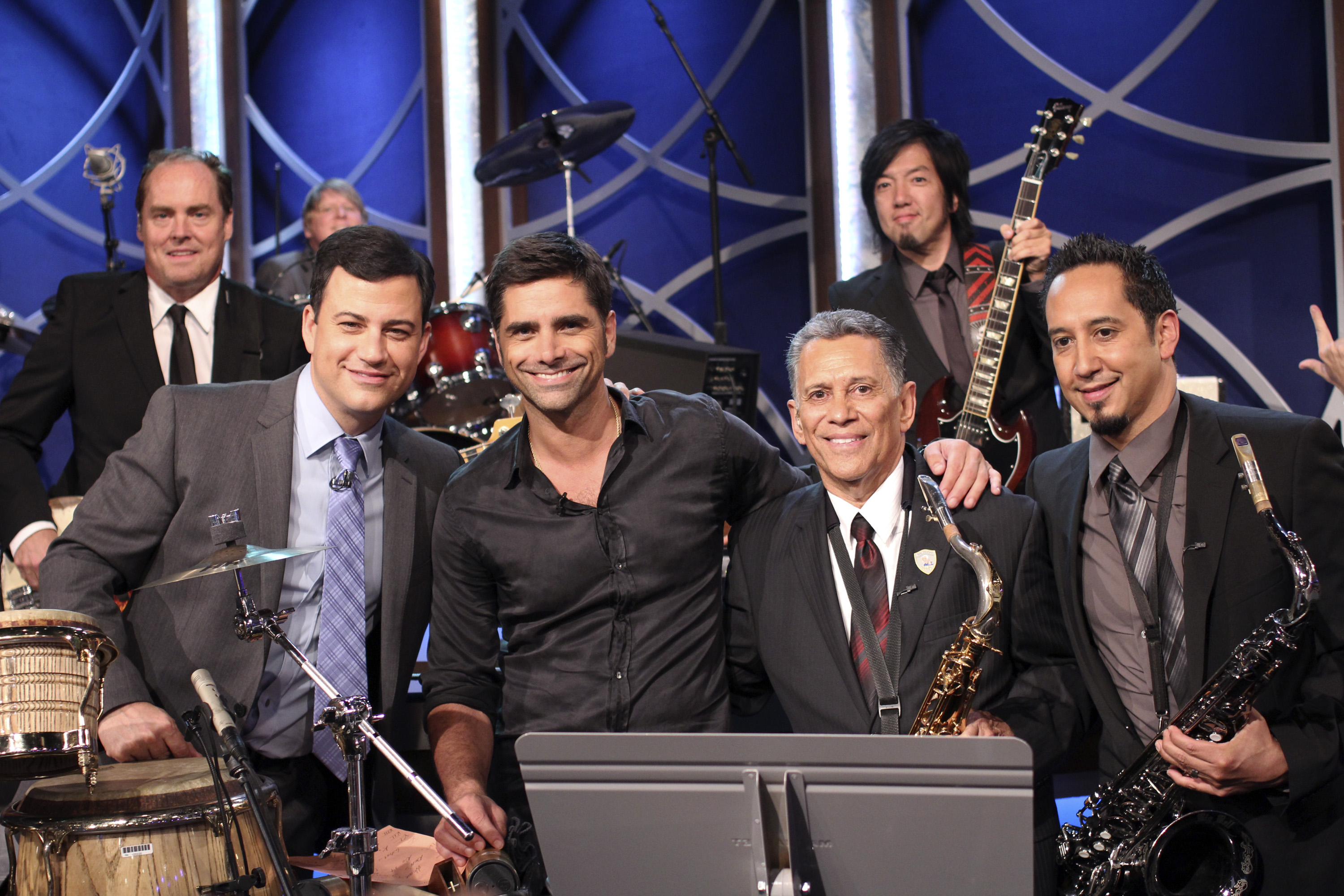 Jimmy Earl, Jonathan Dresel, Jimmy Kimmel, John Stamos, Cleto Escobedo Sr., Toshi Yanagi, Cleto Escobedo III on "Jimmy Kimmel Live!" on October 11, 2011 | Source: Getty Images