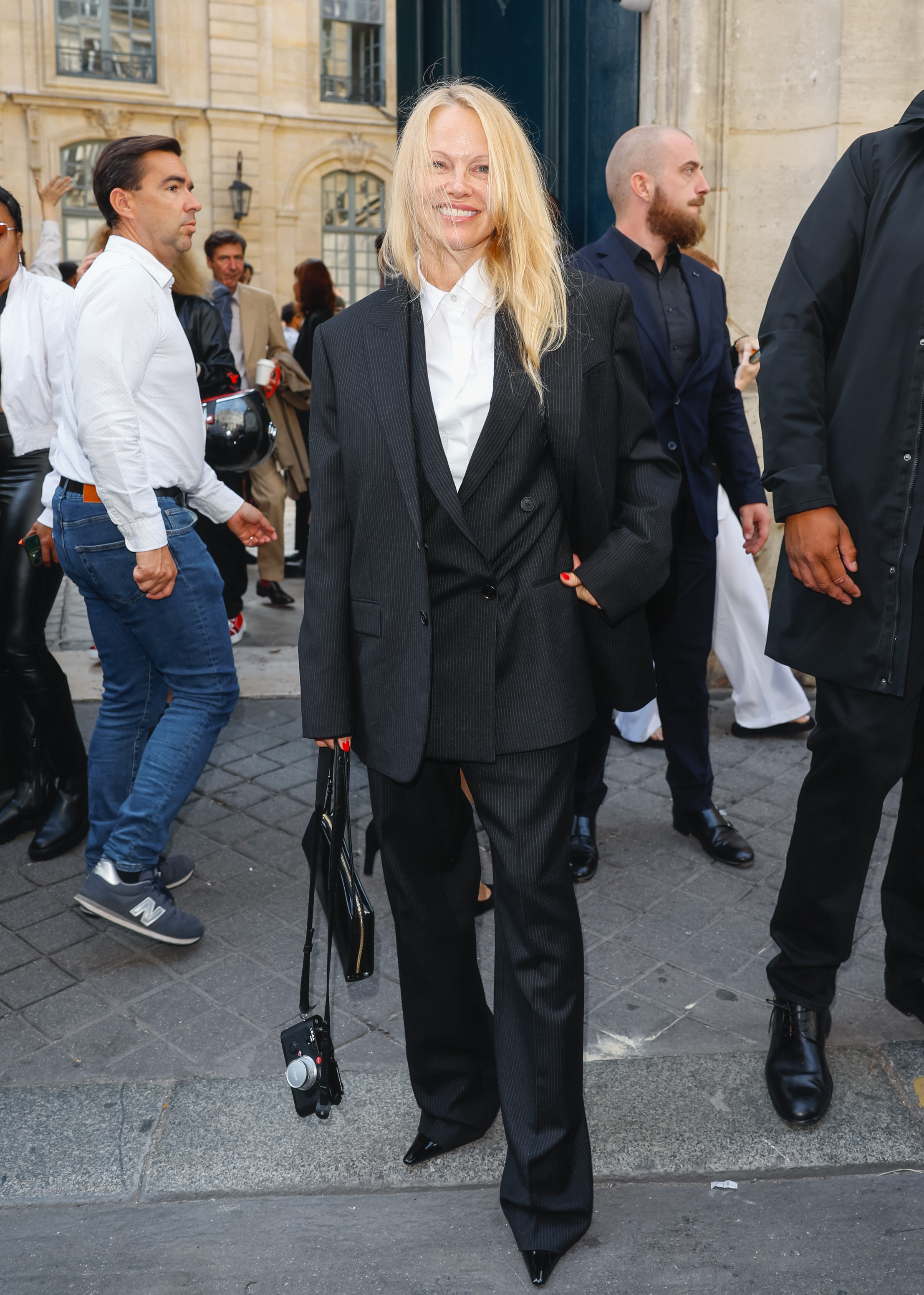 Pamela Anderson at The Row runway show during Paris Fashion Week on September 27, 2023, in France. | Source: Getty Images