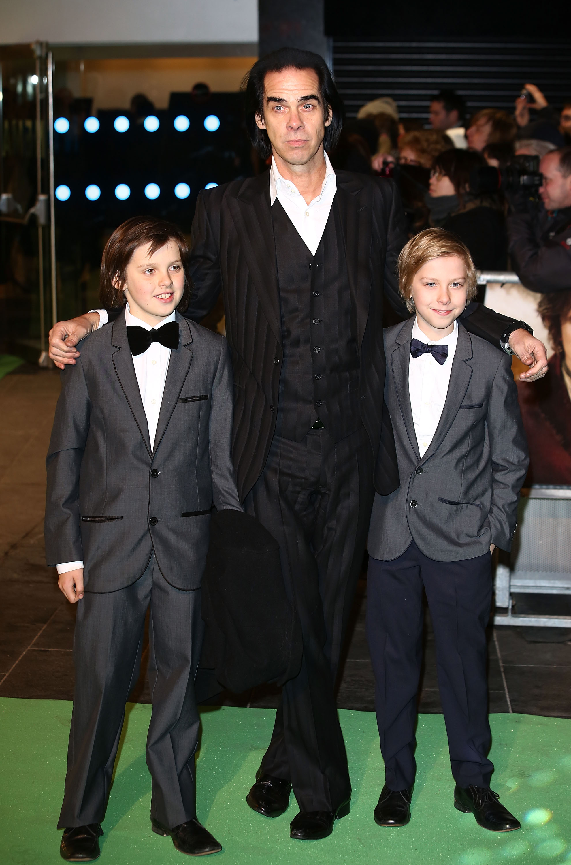 Nick Cave with his sons at the Royal Film Performance of "The Hobbit: An Unexpected Journey" on December 12, 2012, in London, England. | Source: Getty Images