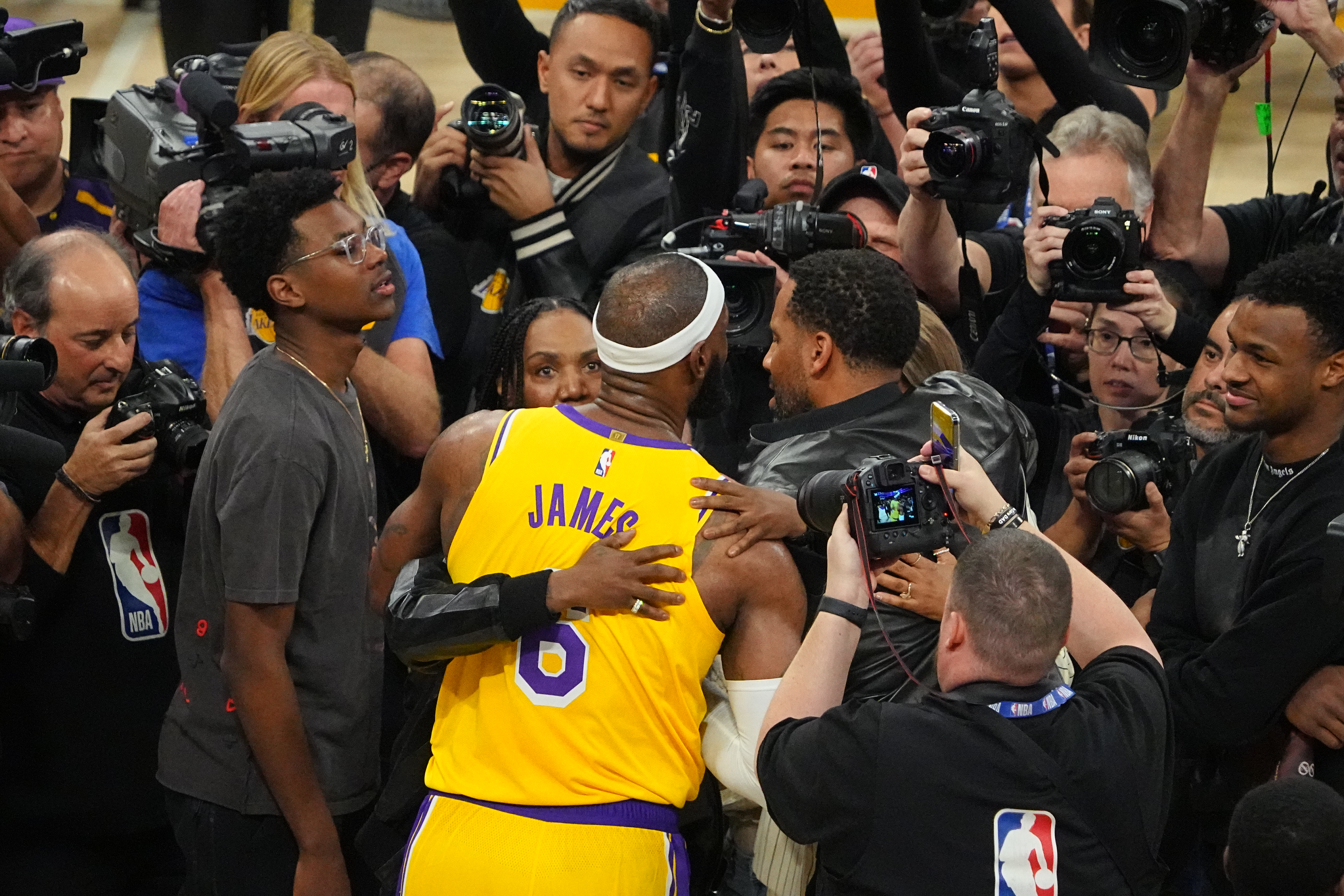 LeBron James hugs his mother Gloria James and his sons after breaking Kareem Abdul-Jabbars, all time scoring record on February 7, 2023 in Los Angeles, California | Source: Getty Images