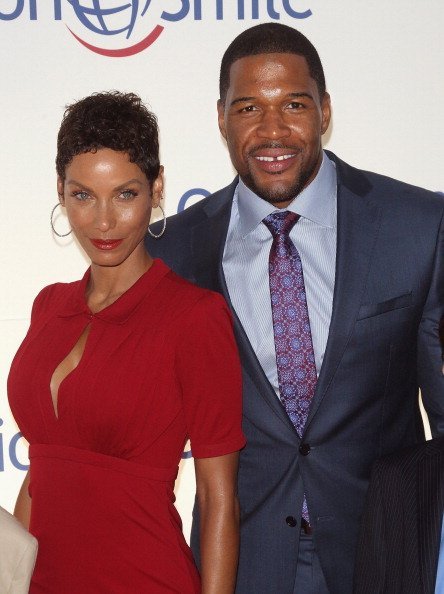 Nicole Murphy and tv personality Michael Strahan attend the Operation Smile's Smile Event at Cipriani Wall Street on May 1, 2014 | Photo: Getty Images