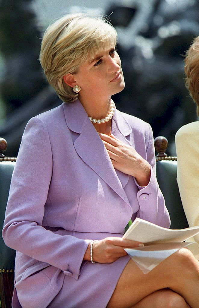 Diana, Princess of Wales, listens to speaker Ken Rutherford at Red Cross headquarters in Washington DC Photo: Getty Images