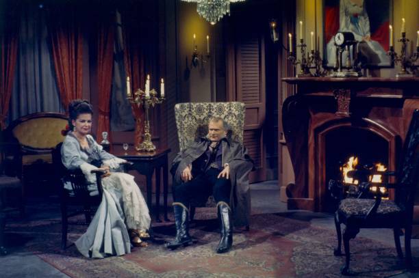 Joan Bennett and Louis Edmonds in an episode of TV series "Dark Shadows" relaxing on set in 1967 | Photo: Getty Images