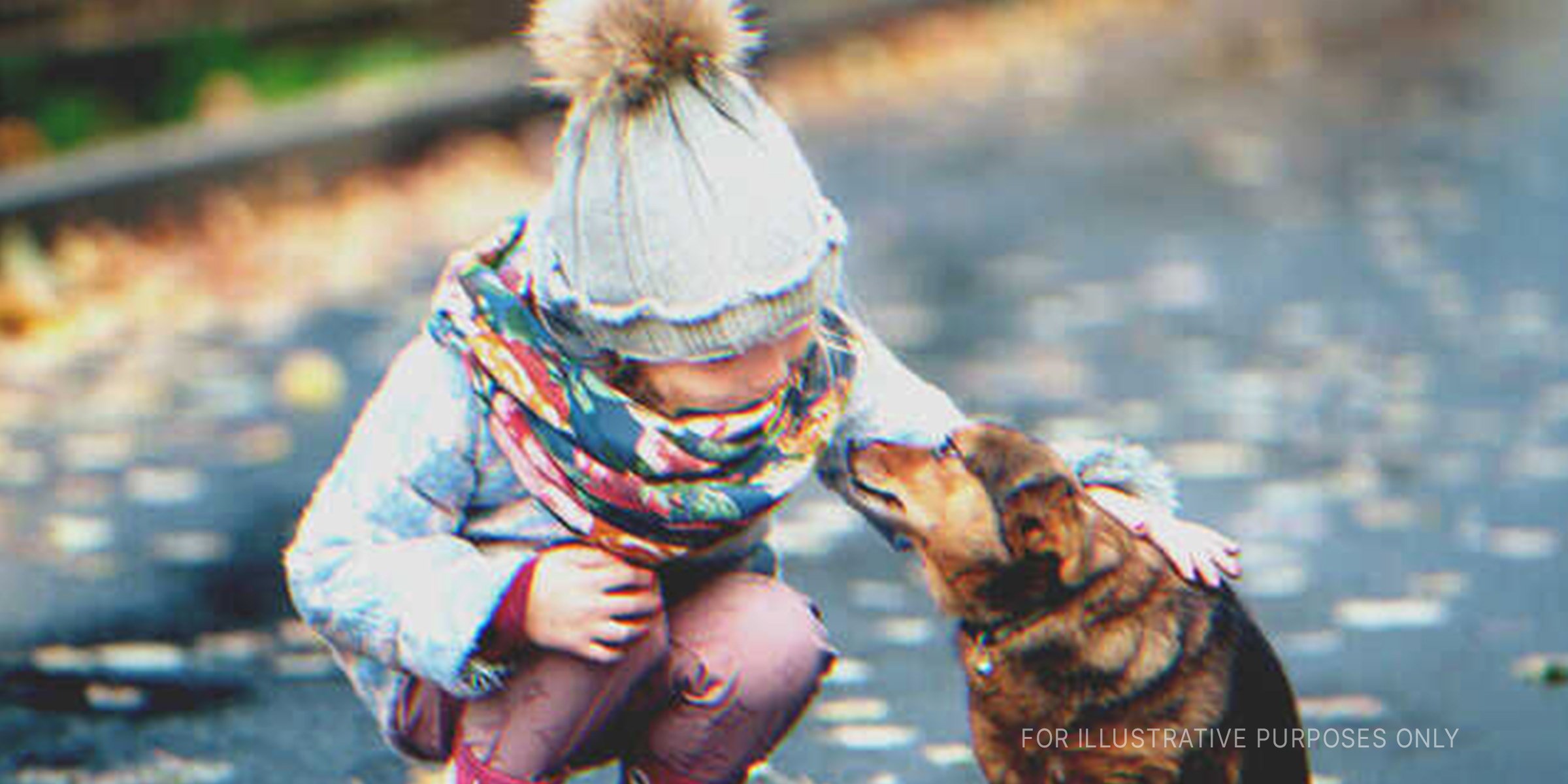 A girl and a dog | Source: Shutterstock