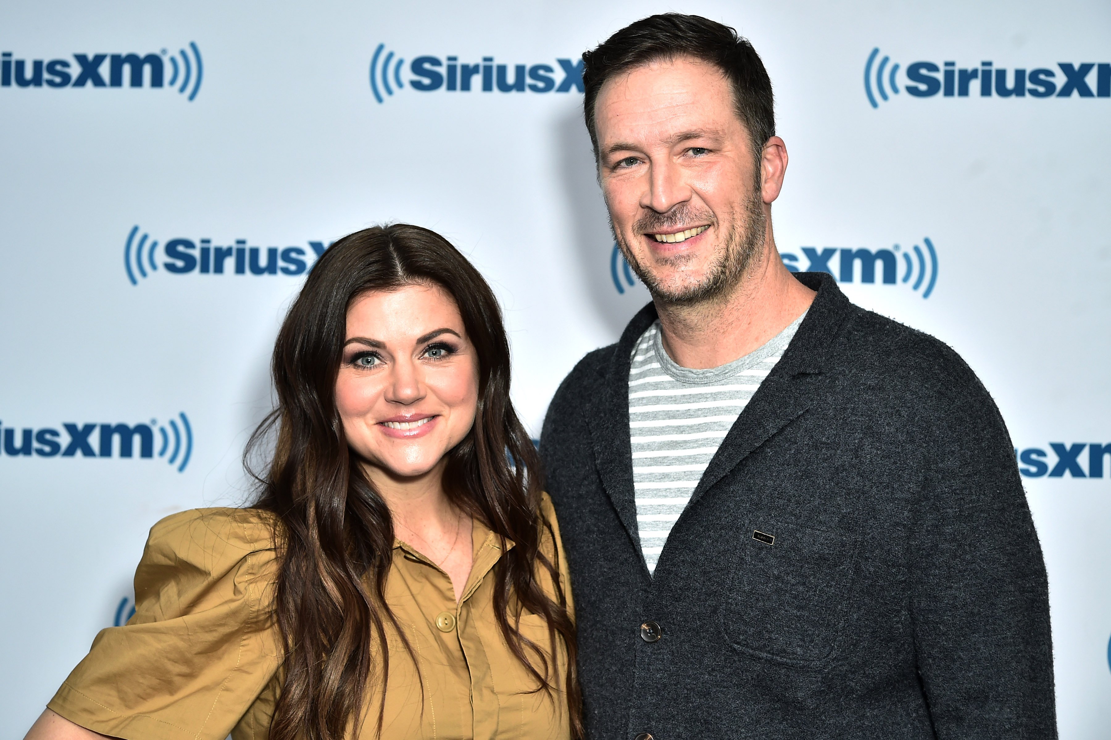 Tiffani Thiessen and Brady Smith at the SiriusXM Studios on May 1, 2019, in New York | Source: Getty Images