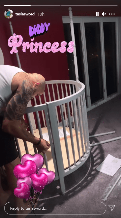 Fantasia Barrino's husband, Kendall Taylor, setting up their baby's crib | Photo: Instagram/tasiasworld