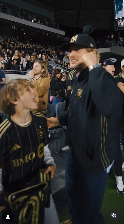 A screenshot of Owen Wilson and his son Ford celebrating in a video shared on Instagram in April 2024. | Source: Instagram/lafc