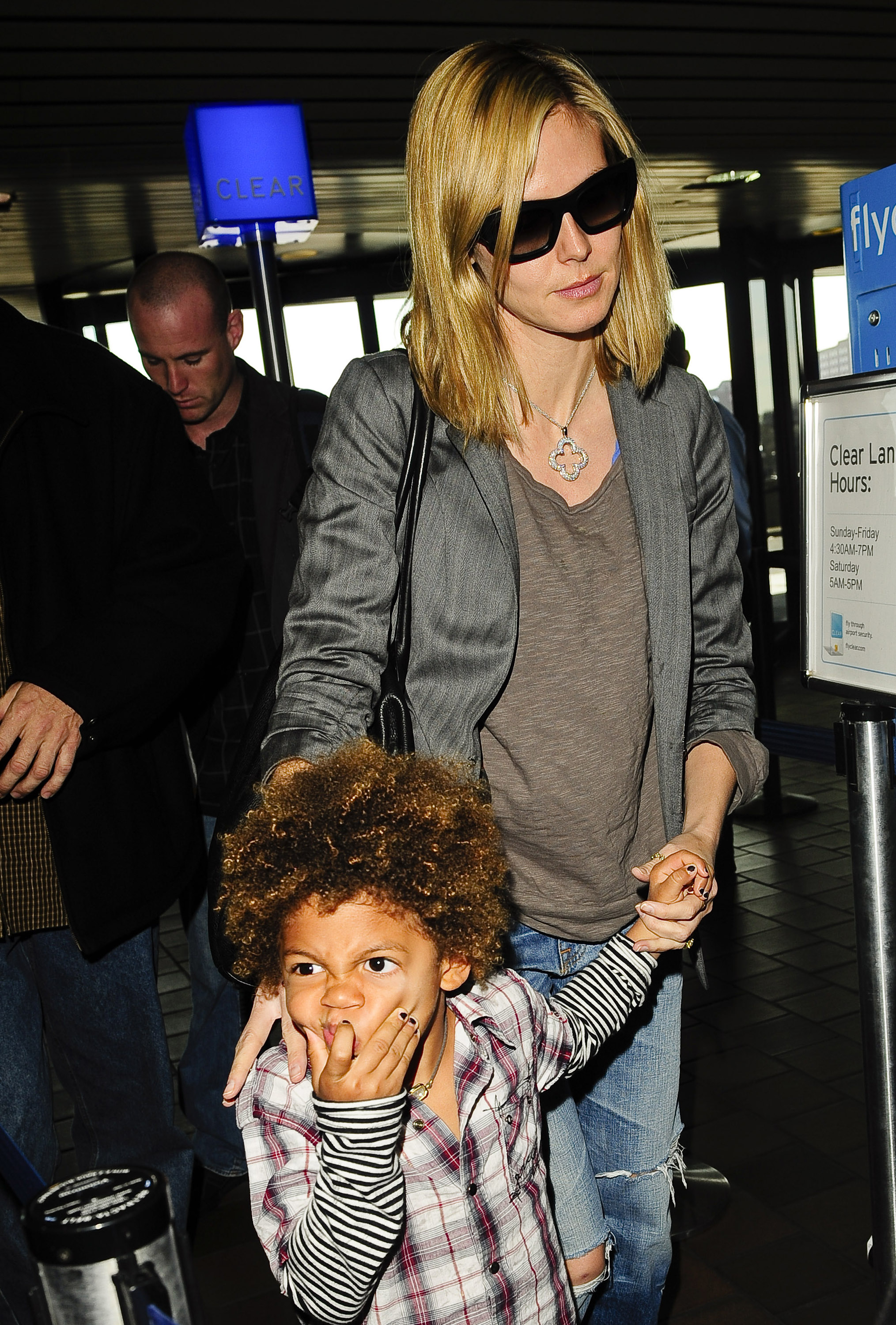 Heidi Klum and her son Henry Samuel seen at the LaGuardia Airport in New York City on April 17, 2009. | Source: Getty Images