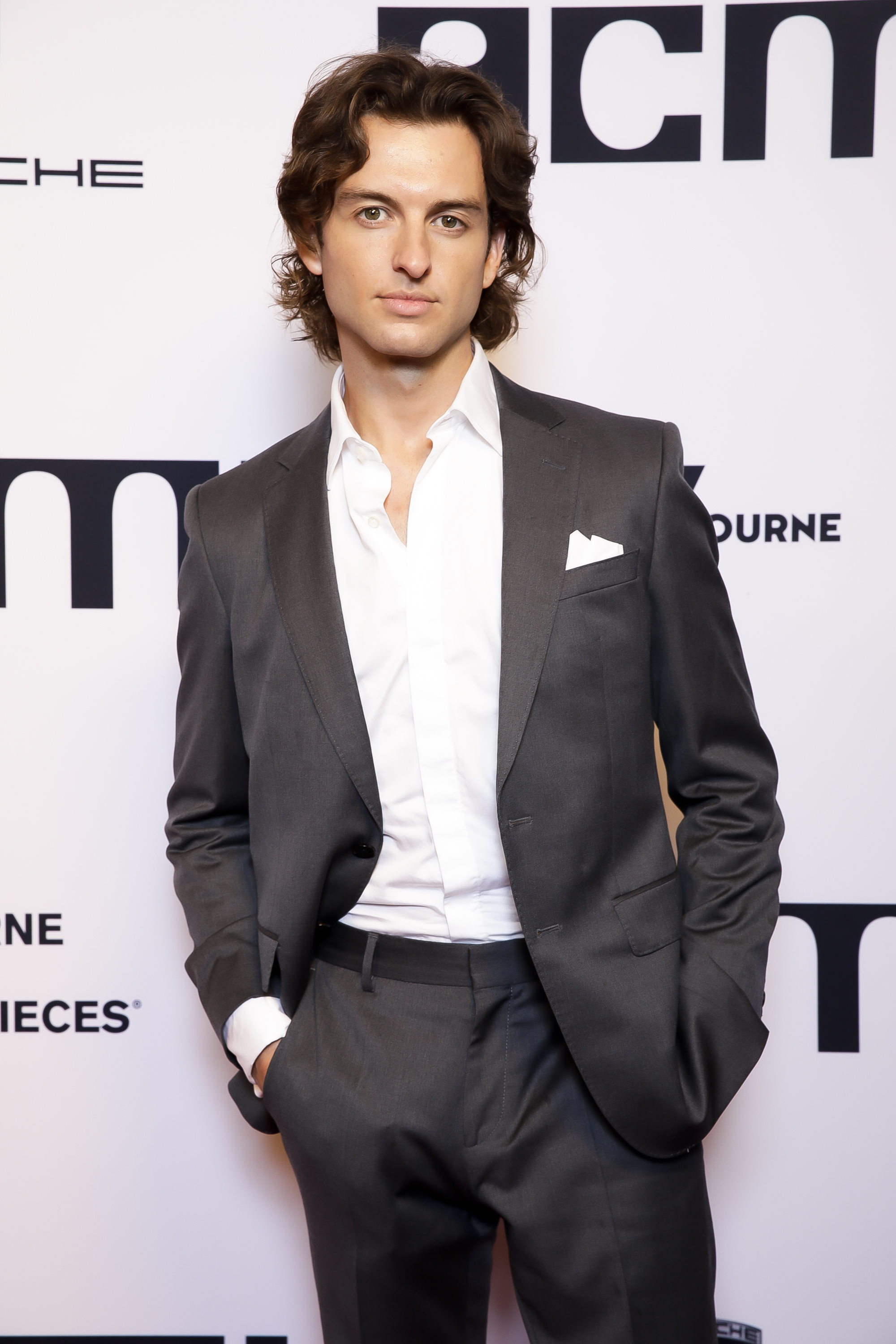 Cameron Robbie poses as he arrives at Goddess exhibition opening on April 4, 2023, in Melbourne, Australia | Source: Getty Images
