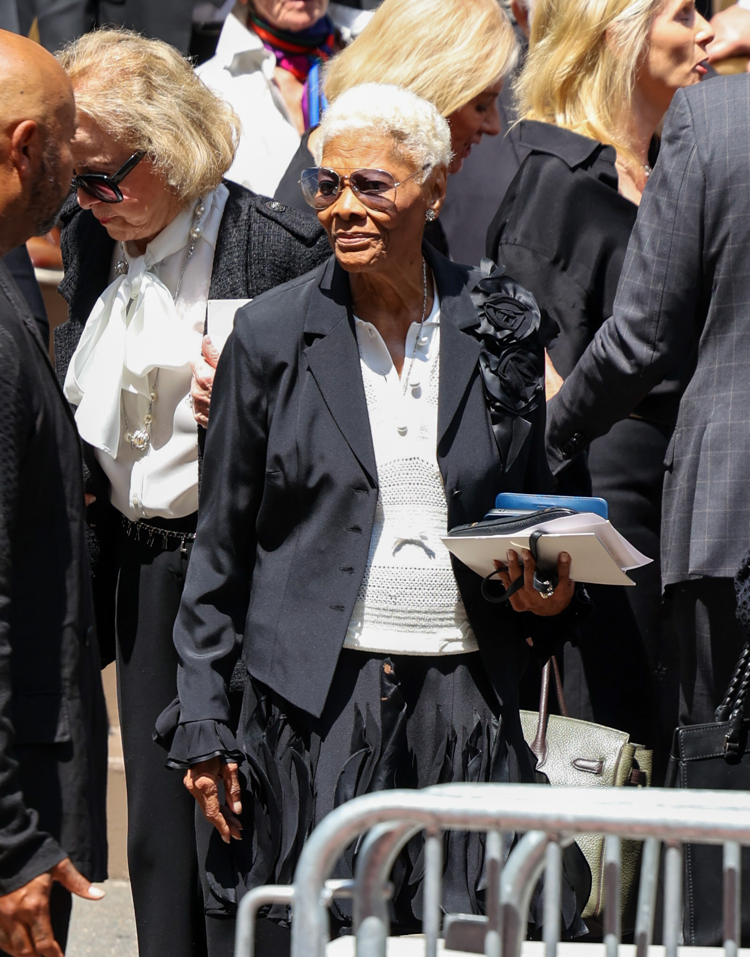 Known for classics including "Walk On By" and "That's What Friends Are For," Dionne Warwick joined fellow artists and industry leaders in remembering Clive Davis. | Source: Getty Images