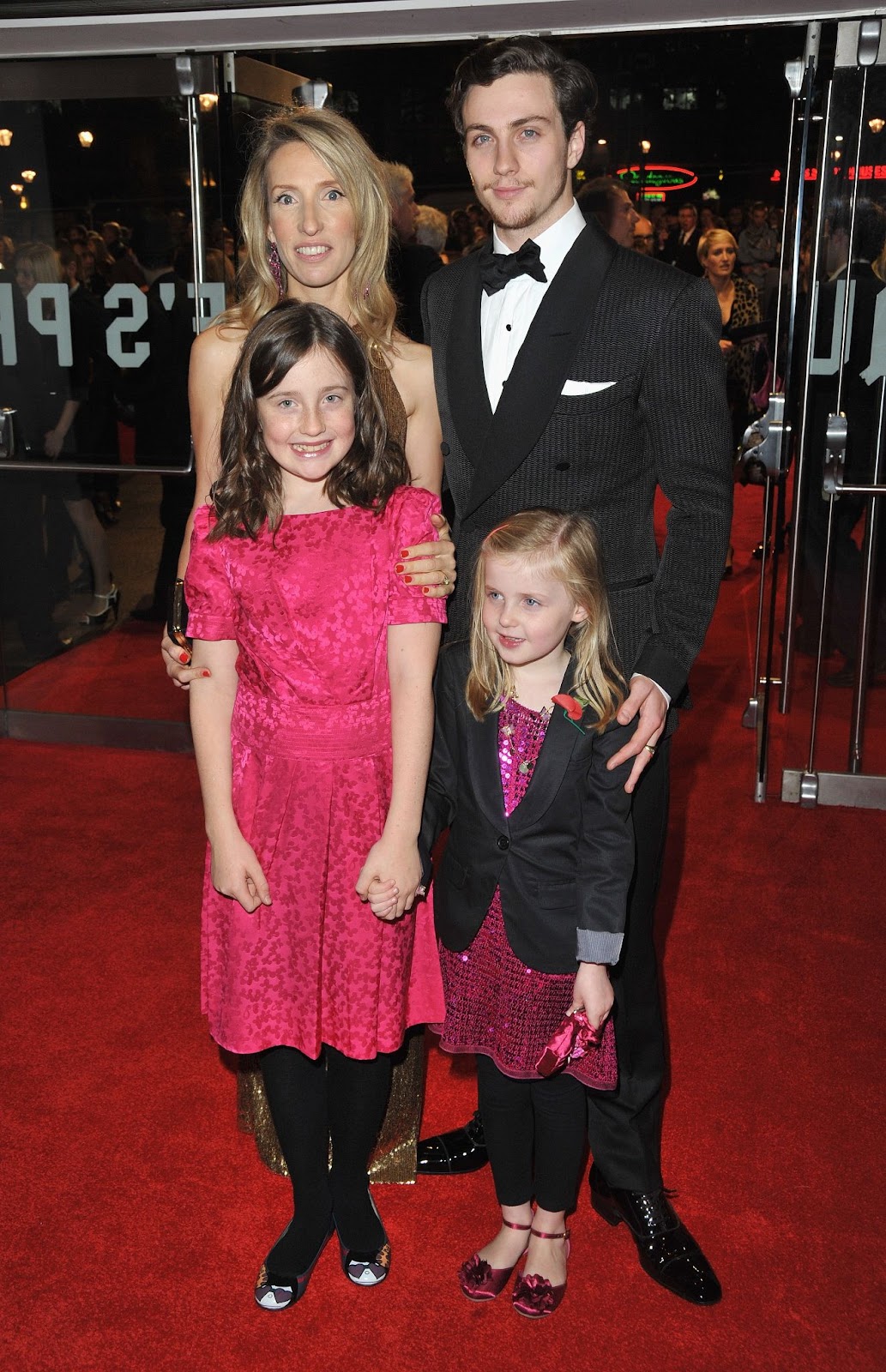 Sam Taylor-Johnson and Aaron Taylor-Johnson with their daughters at the premiere of "Nowhere Boy" during The Times BFI London Film Festival in England, on October 29, 2009 | Source: Getty Images