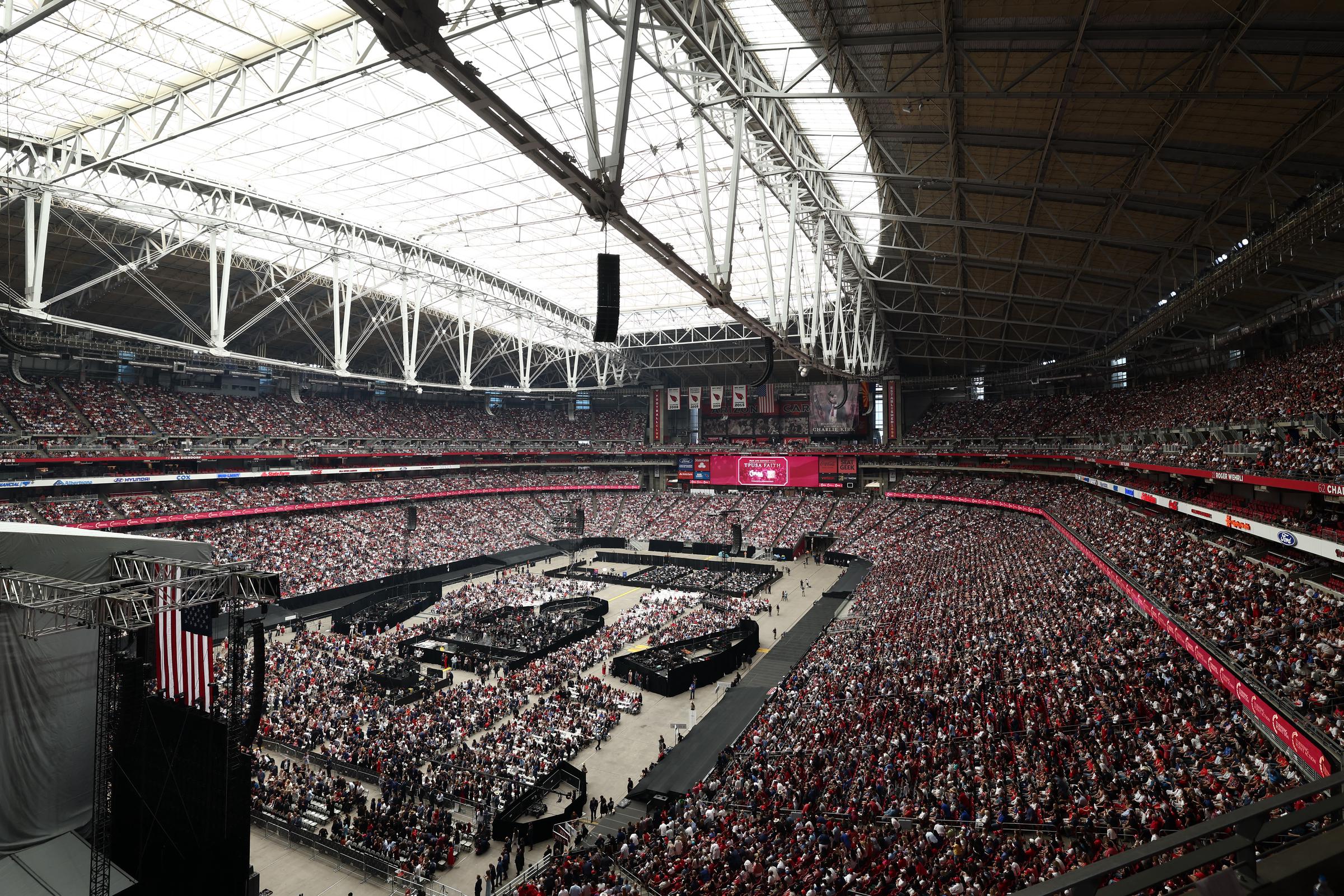 People gather for Charlie Kirk's memorial service at State Farm Stadium on September 21, 2025 in Glendale, Arizona | Source: Getty Images