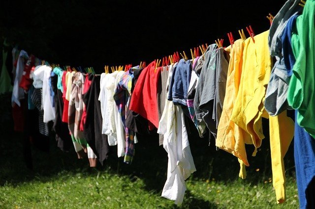 Clothes hanged on a line for drying. | Source: Pixabay