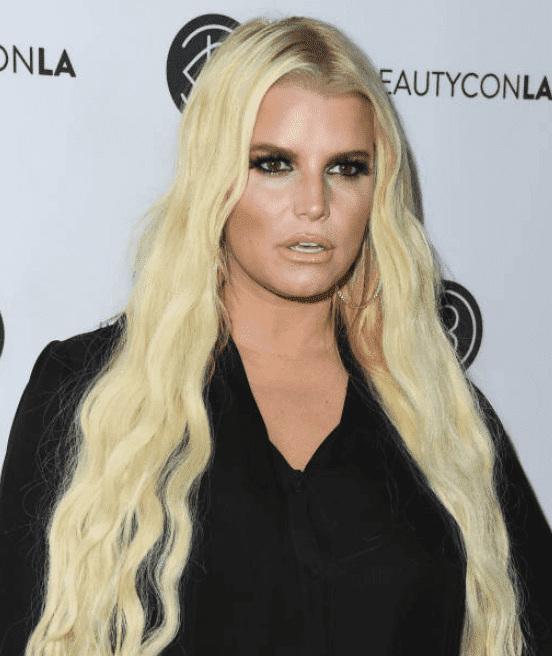 Jessica Simpson poses for cameras at the Beautycon Festival LA, at Los Angeles Convention Center, on July 14, 2018, in Los Angeles, California | Source Getty Images (Photo by Jon Kopaloff/FilmMagic)