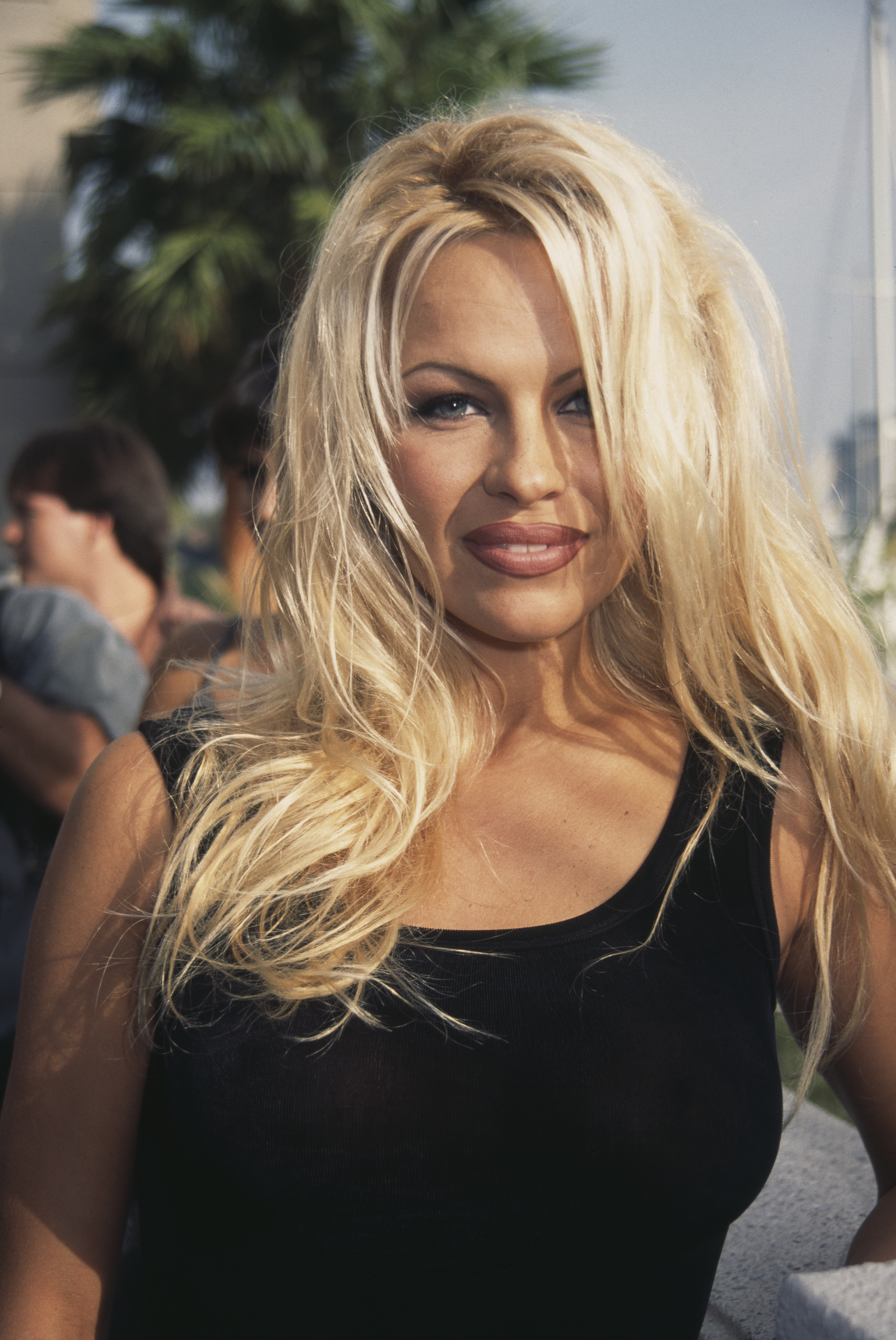 Pamela Anderson attends a "Baywatch" cast party, on Malibu Pier in Malibu, California, 21st October 1994. | Source: Getty Images