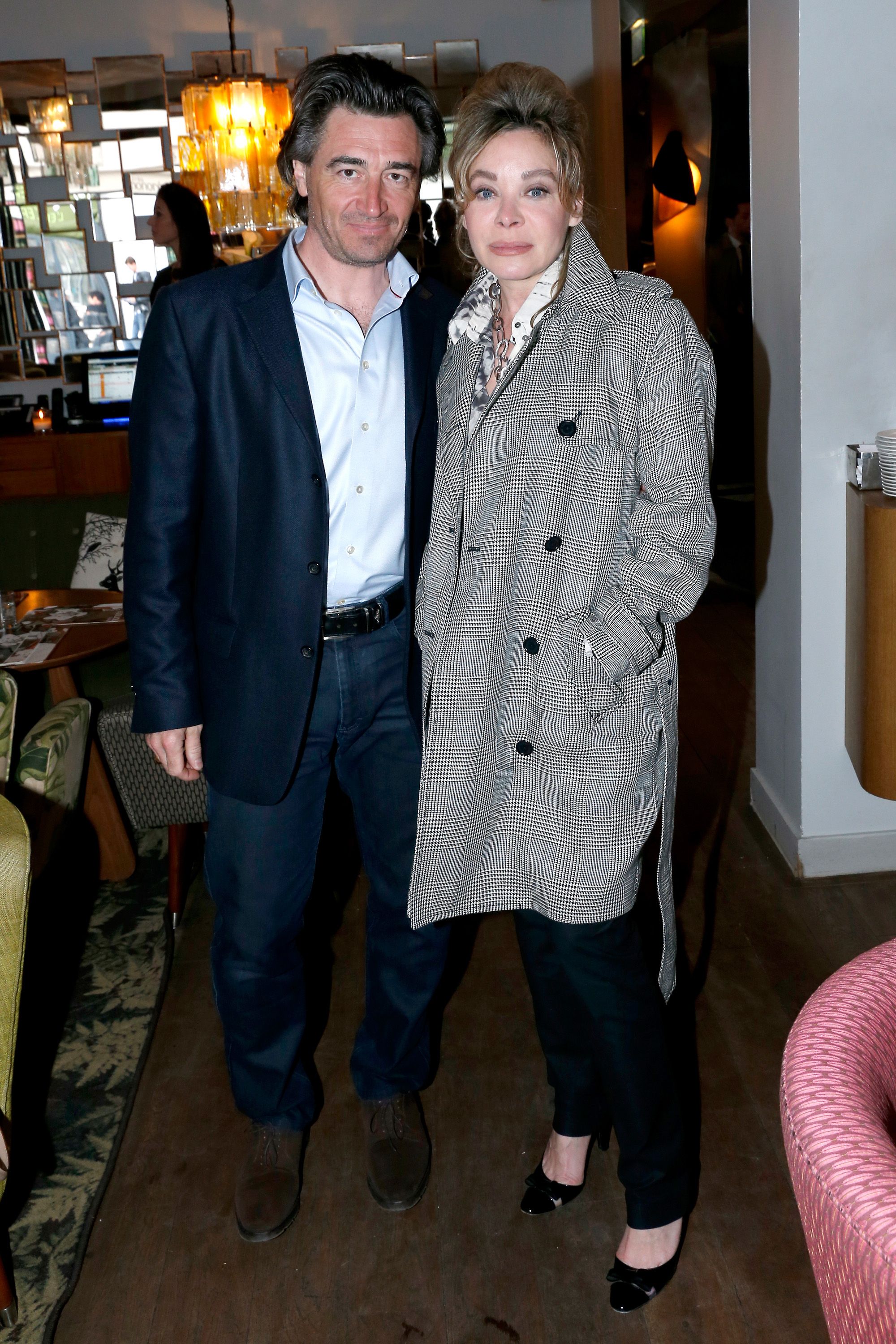 Grace de Capitani et son compagnon Jean-Pierre Jacquin participent au Tres Honore Bar le 18 avril 2013 à Paris, France. | Photo : Getty Images