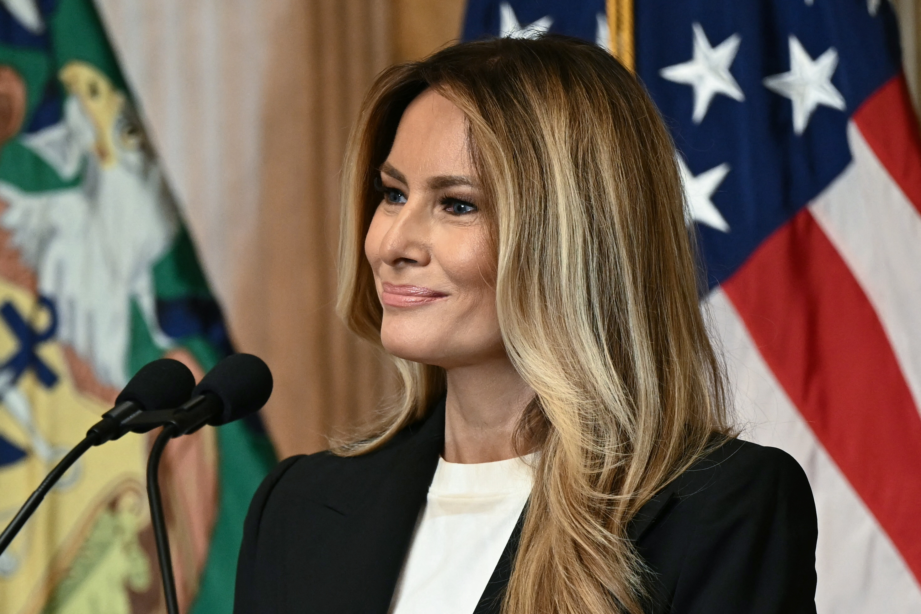 Melania said she was saddened by Graham's unexpected passing and praised his unwavering commitment to the nation. Officials have not connected her recent absences to the reported Iran-linked threat reviewed by the Secret Service. | Source: Getty Images