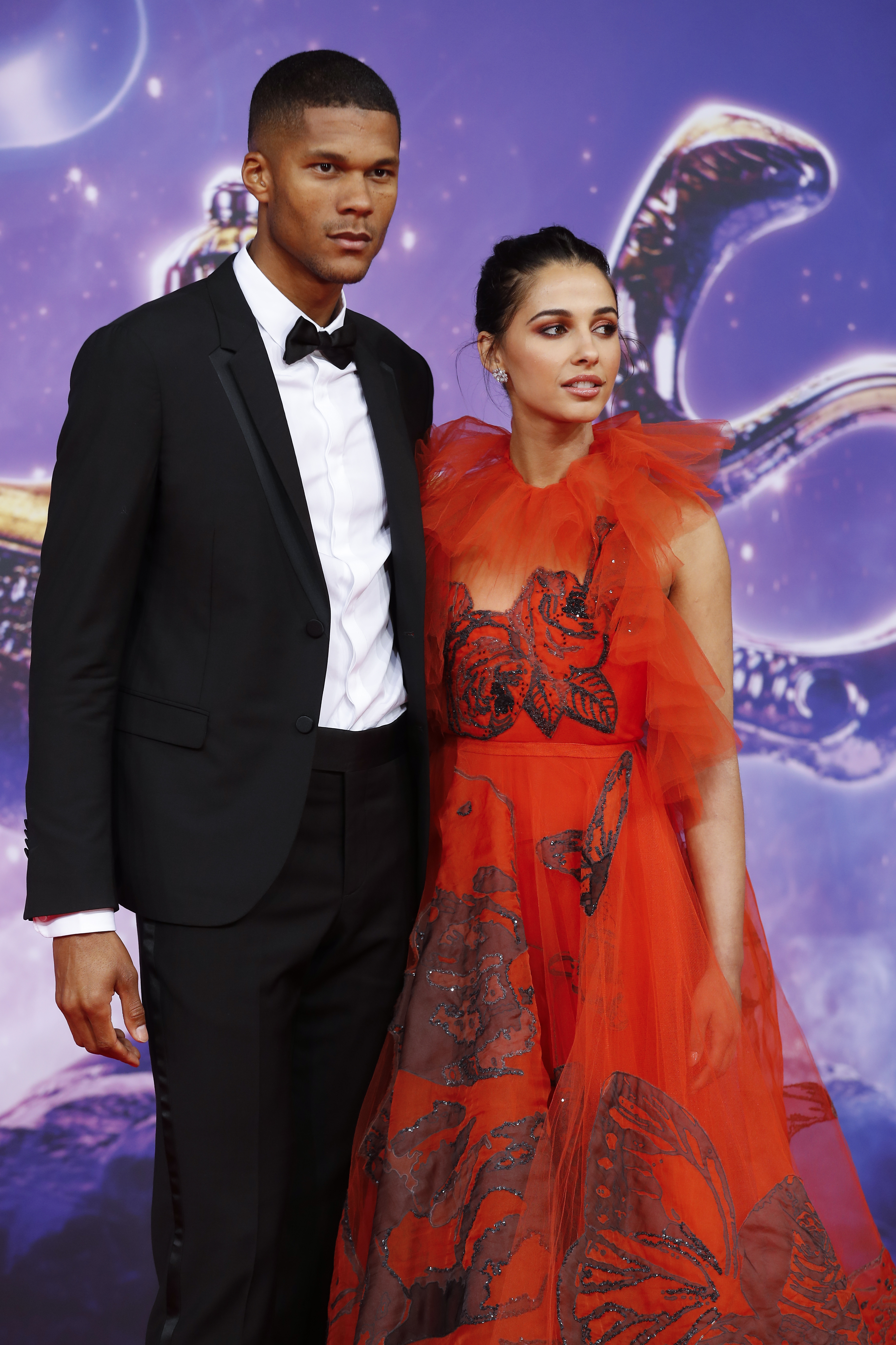 Jordan Spence and Naomi Scott are pictured at the movie premiere of "Aladdin" at UCI Luxe Mercedes Platz on May 8, 2019, in Berlin, Germany | Source: Getty Imges