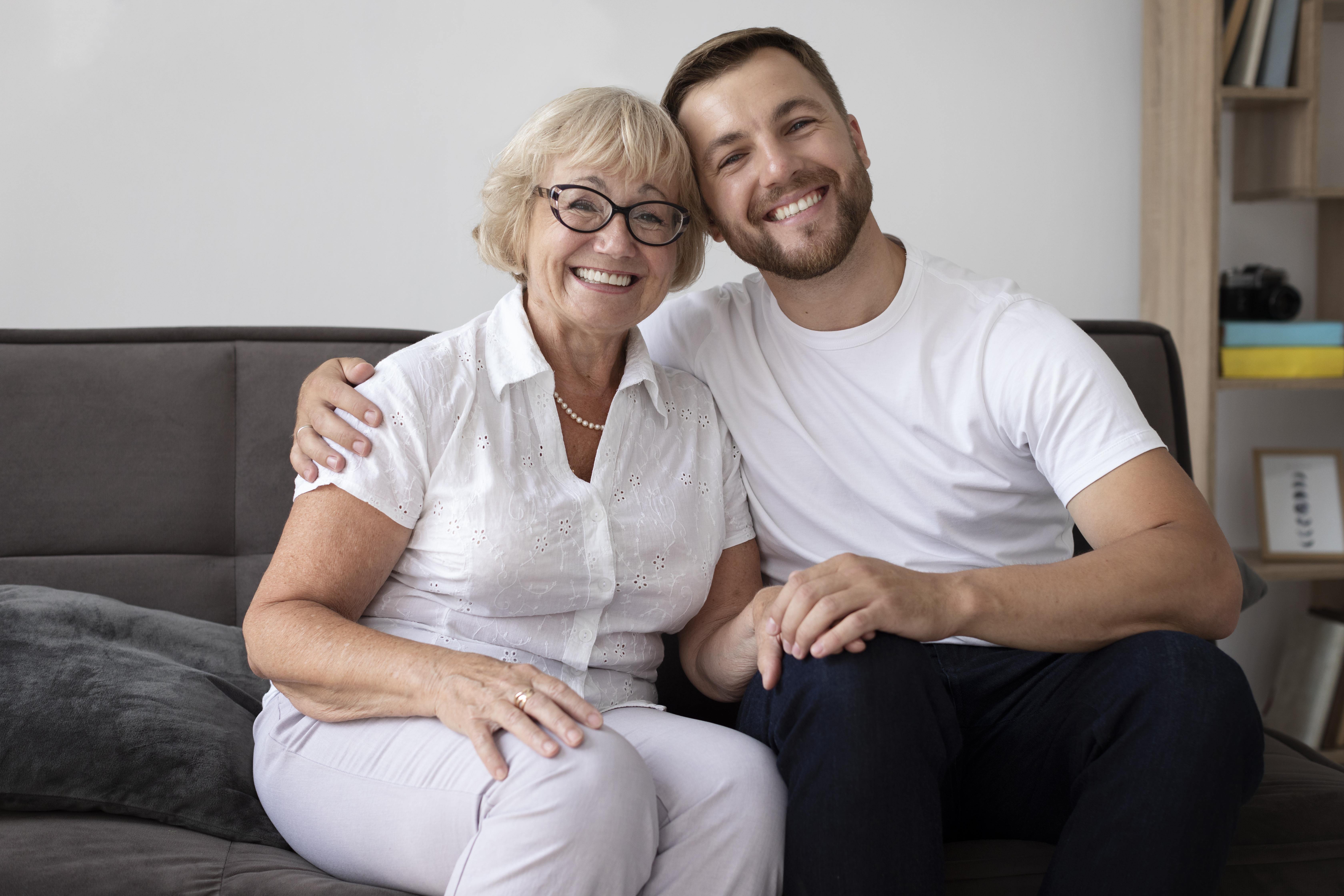 A son embracing his mother | Source: Freepik