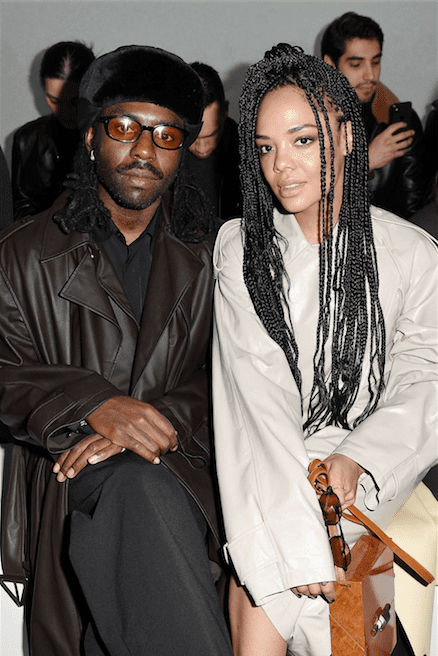 Dev Hynes and Tessa Thompson attend the Bottega Veneta fashion show during the Milano Fashion Week Fall / Winter 2020 - 2021 on February 22, 2020 in Milan, Italy. | Source: Getty Images