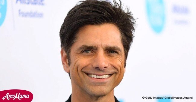 John Stamos shared cute photo holding little Billy and was dad-shamed