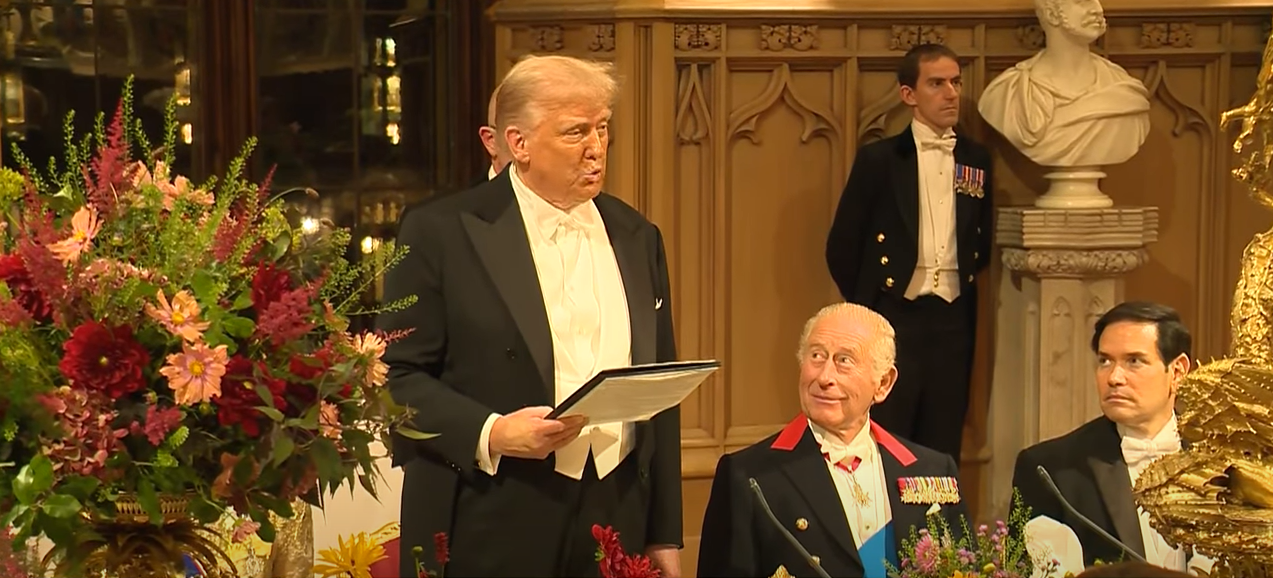 King Charles III looks at President Trump's as he gives his speech during the state banquet in Windsor Castle, held on September 17, 2025 | Source: YouTube/@WhiteHouse