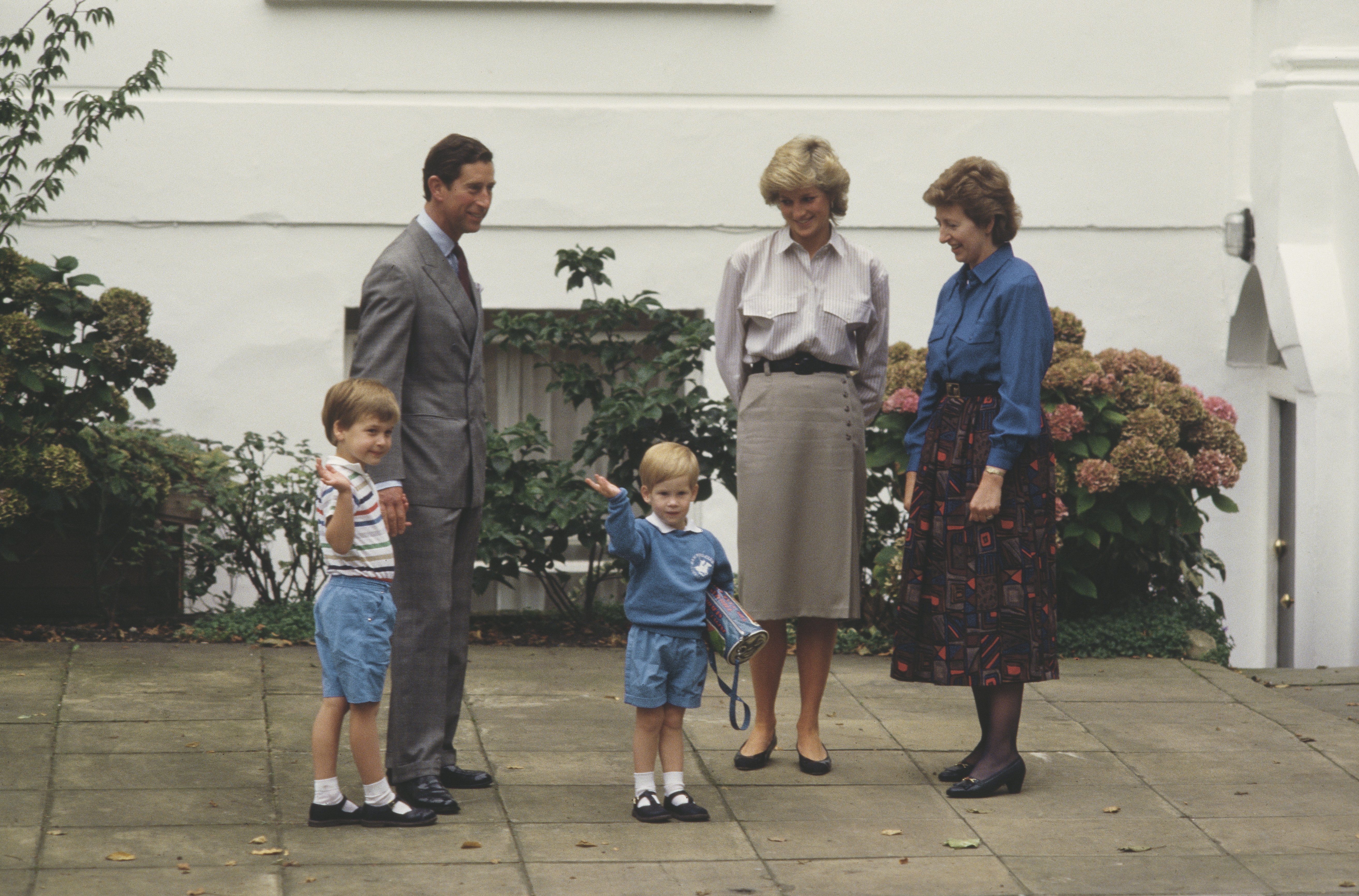 Prince Charles, Princess Diana, and Prince William attending Prince Harry's first day at Mrs Mynors' nursery school in September 1987 in London. | Source: Getty Images