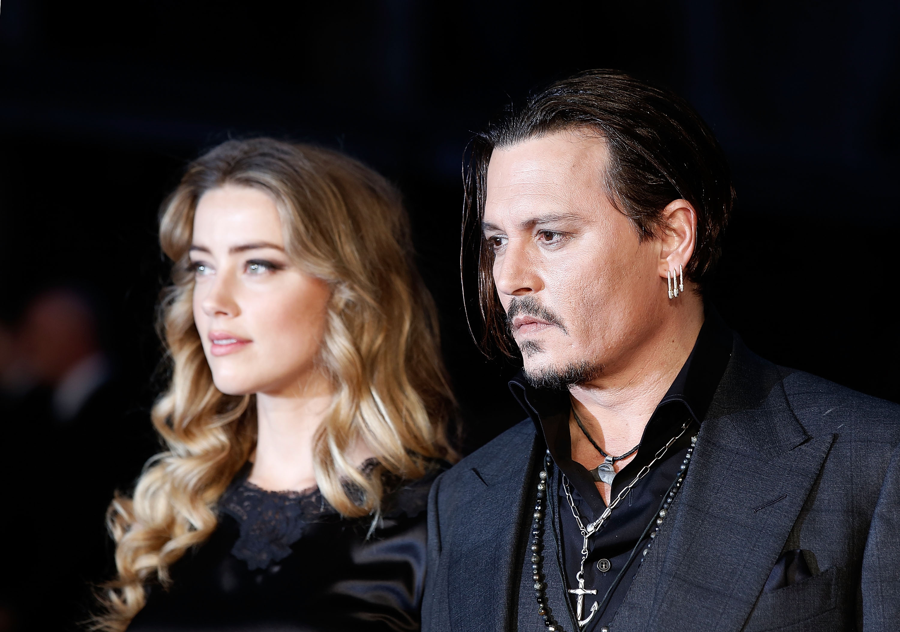 Amber Heard and Johnny Depp at Odeon Leicester Square on October 11, 2015 in London, England | Source: Getty Images