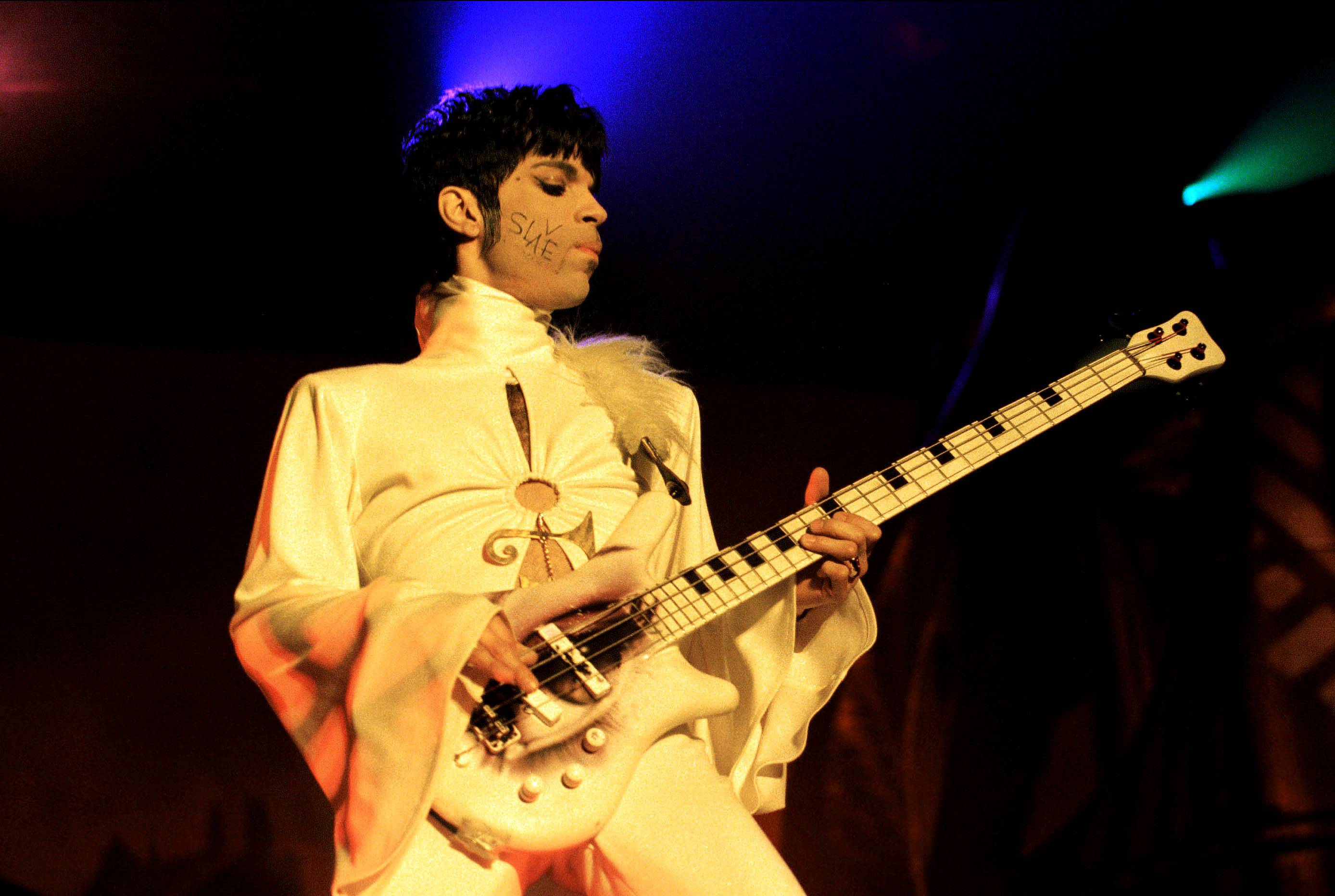 Prince performs at the his "Ultimate Live Experience Tour" on March 25, 1995 in Netherlands | Source: Getty Images