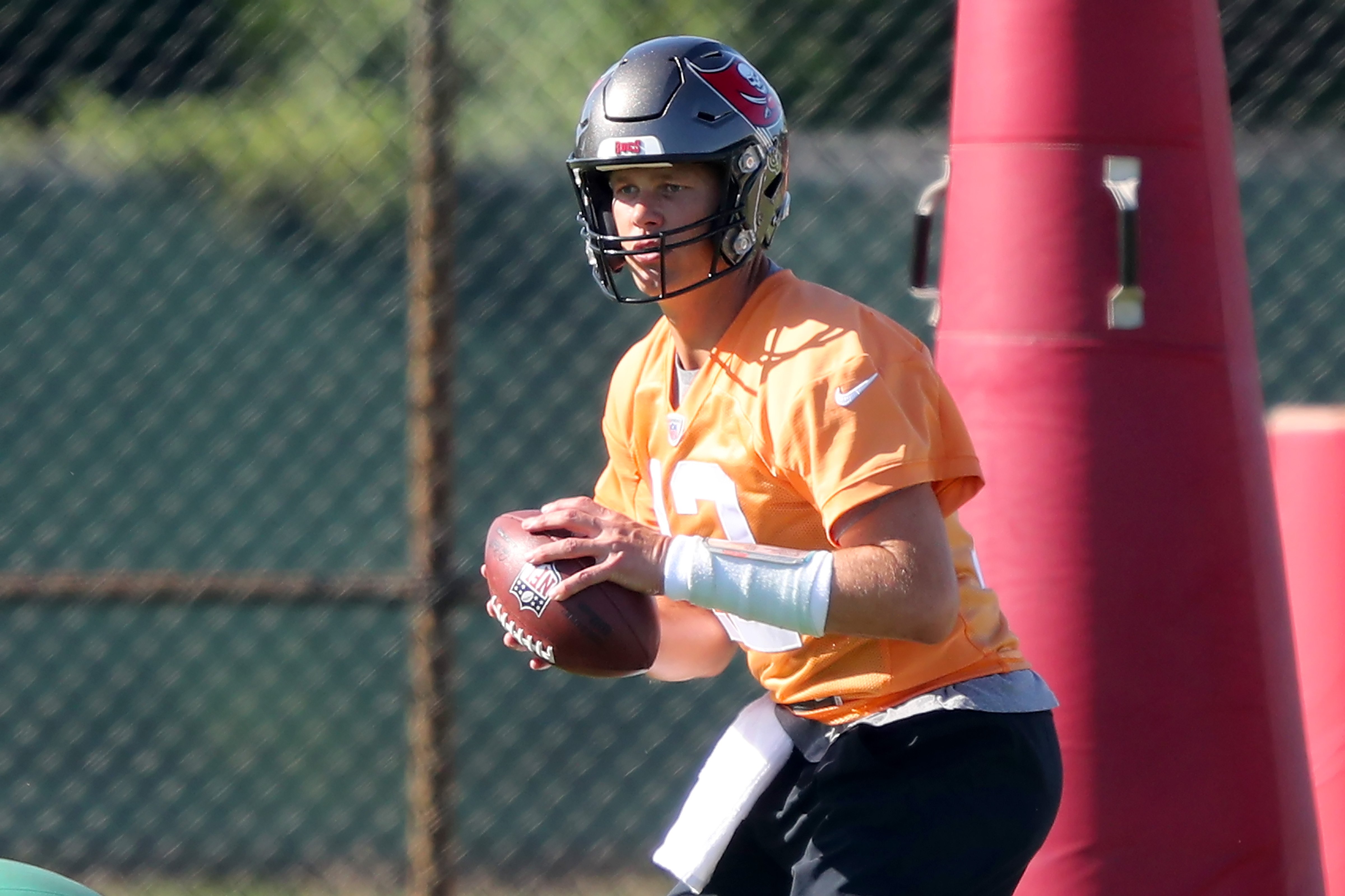 Tom Brady goes through a drill during the Tampa Bay Buccaneers Minicamp on June 07, 2022, at the AdventHealth Training Center at One Buccaneer Place in Tampa, Florida. | Source: Getty Images