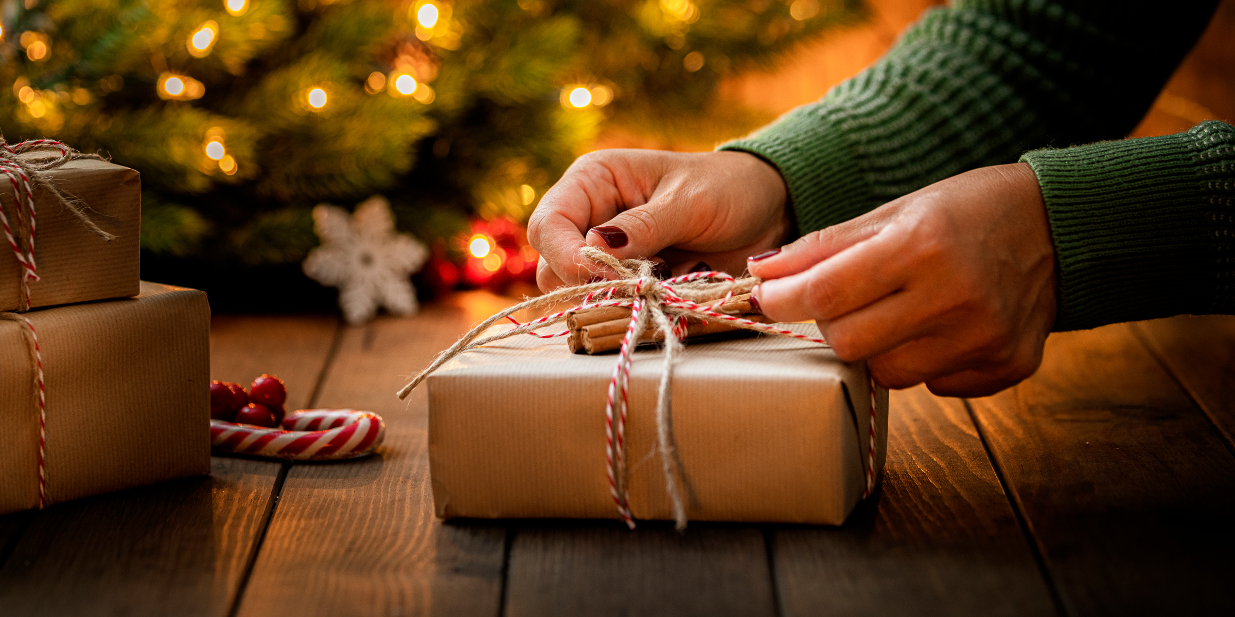 A woman packing a present | Source: Getty Images