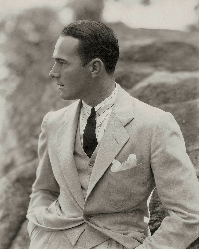 A portrait of William Haines wearing a three piece flannel suit circa 1930. | Photo: Getty Images