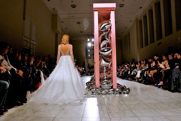 A model wearing a creation wedding dress at Zappeio Megaro in Athens | Photo: Getty Images