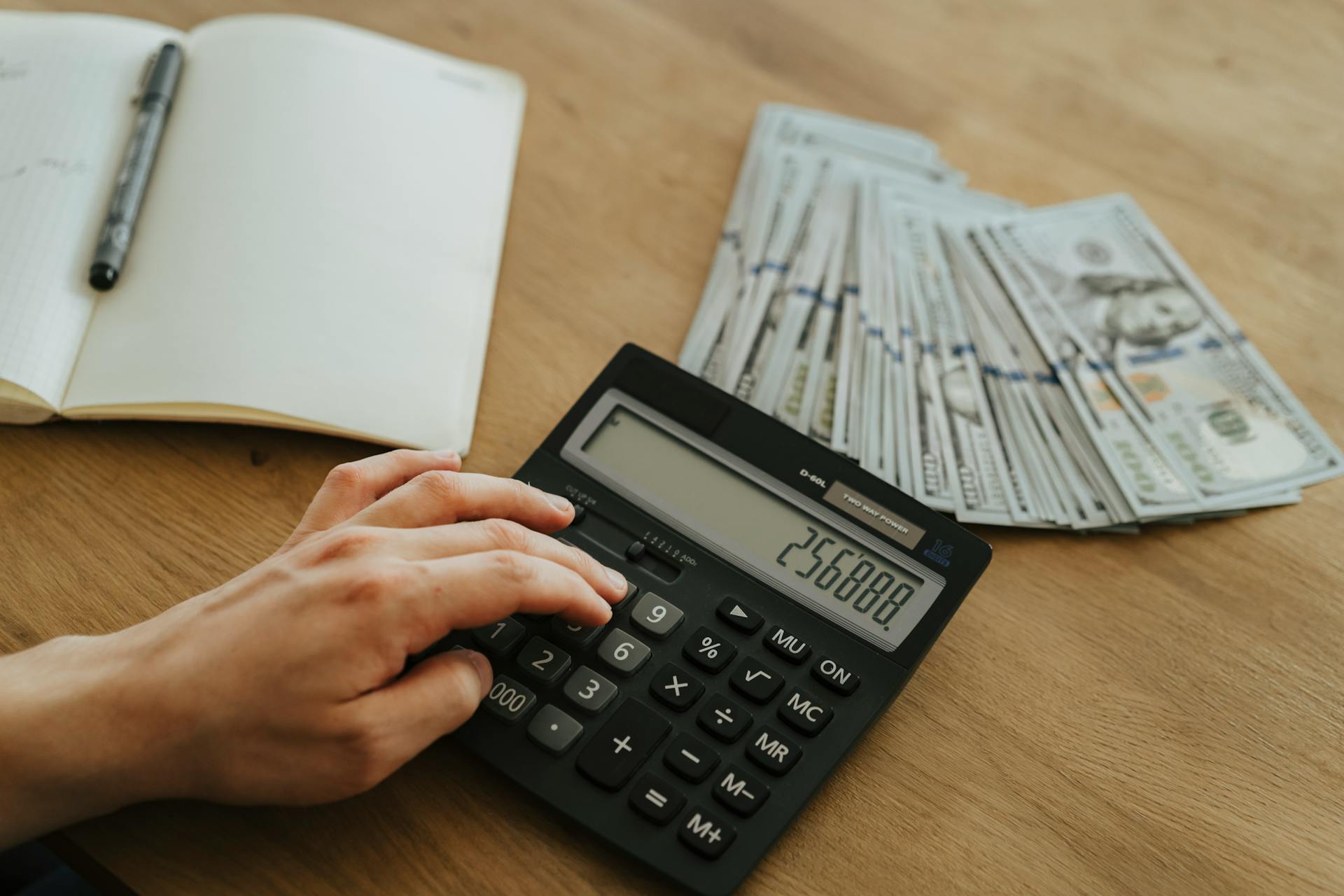 A person using a calculator | Source: Pexels