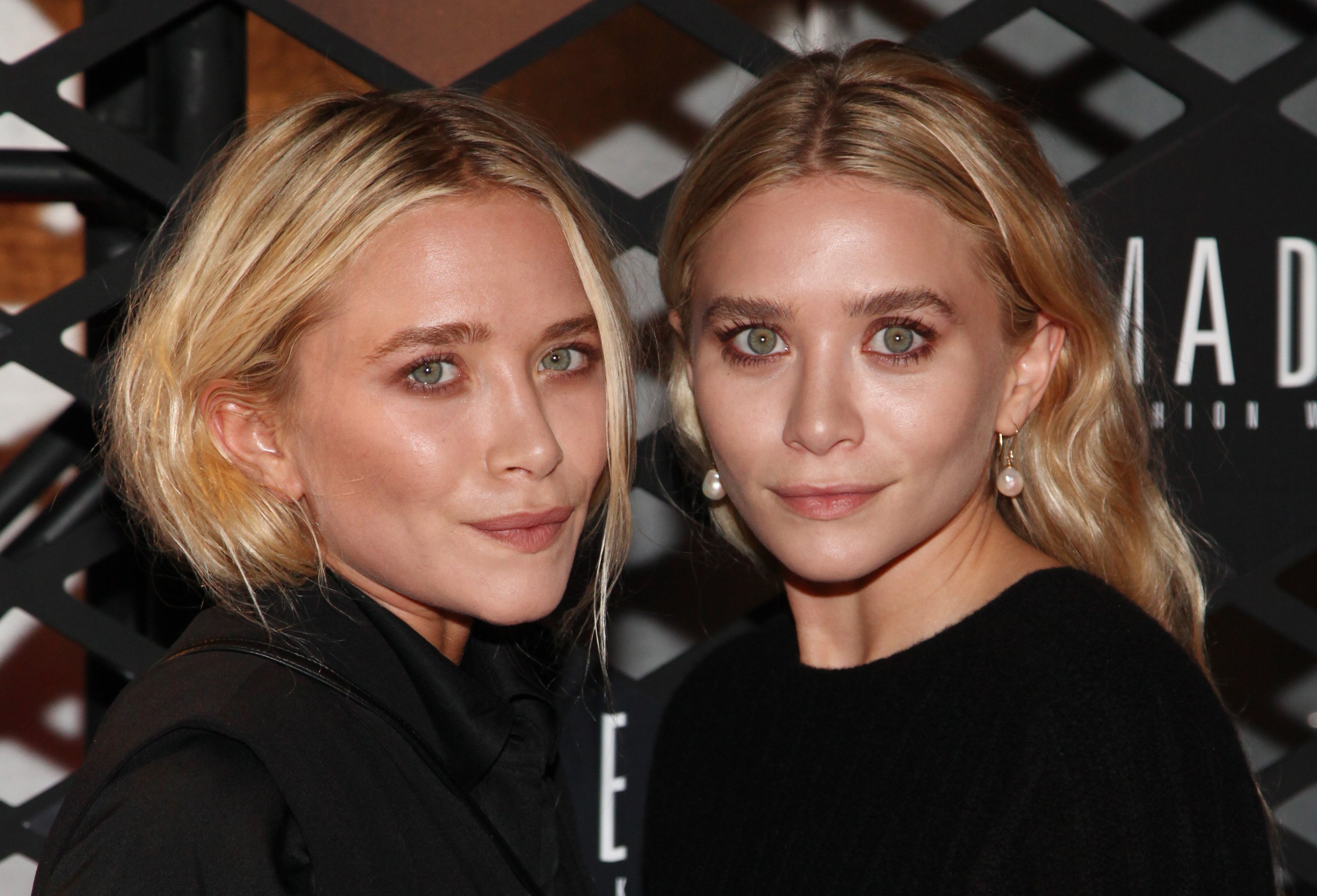 Mary-Kate Olsen and Ashley Olsen attend the Lexus Design Disrupted Fashion Event at SIR Stage 37 on September 5, 2013 in New York City | Source: Getty Images 