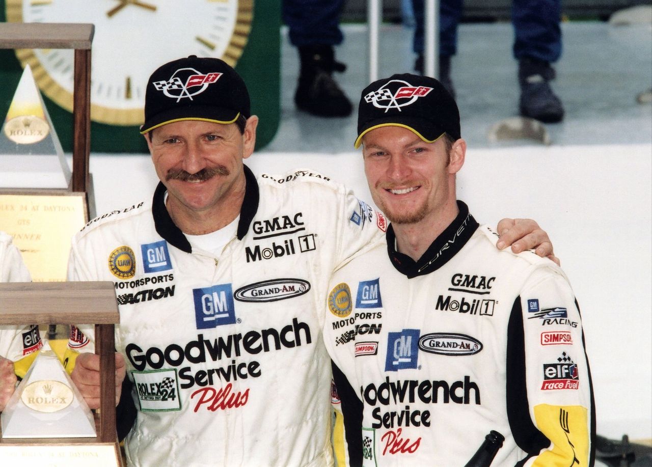 Dale Earnhardt Sr. and Dale Earnhard, Jr. smile at the raceway in Daytona Beach, Florinda on February 4, 2001. | Source: Getty Images