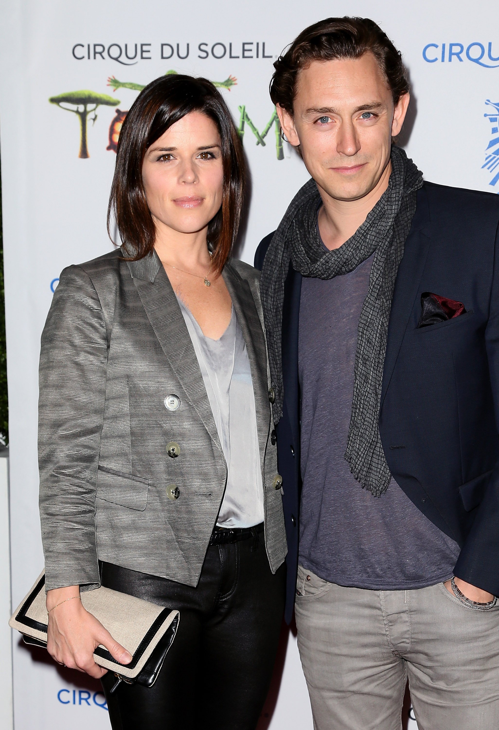 Neve Campbell and JJ Feild attend the opening night of Cirque du Soleil's "Totem" at the Santa Monica Pier on January 21, 2014, in Santa Monica, California. | Source: Getty Images