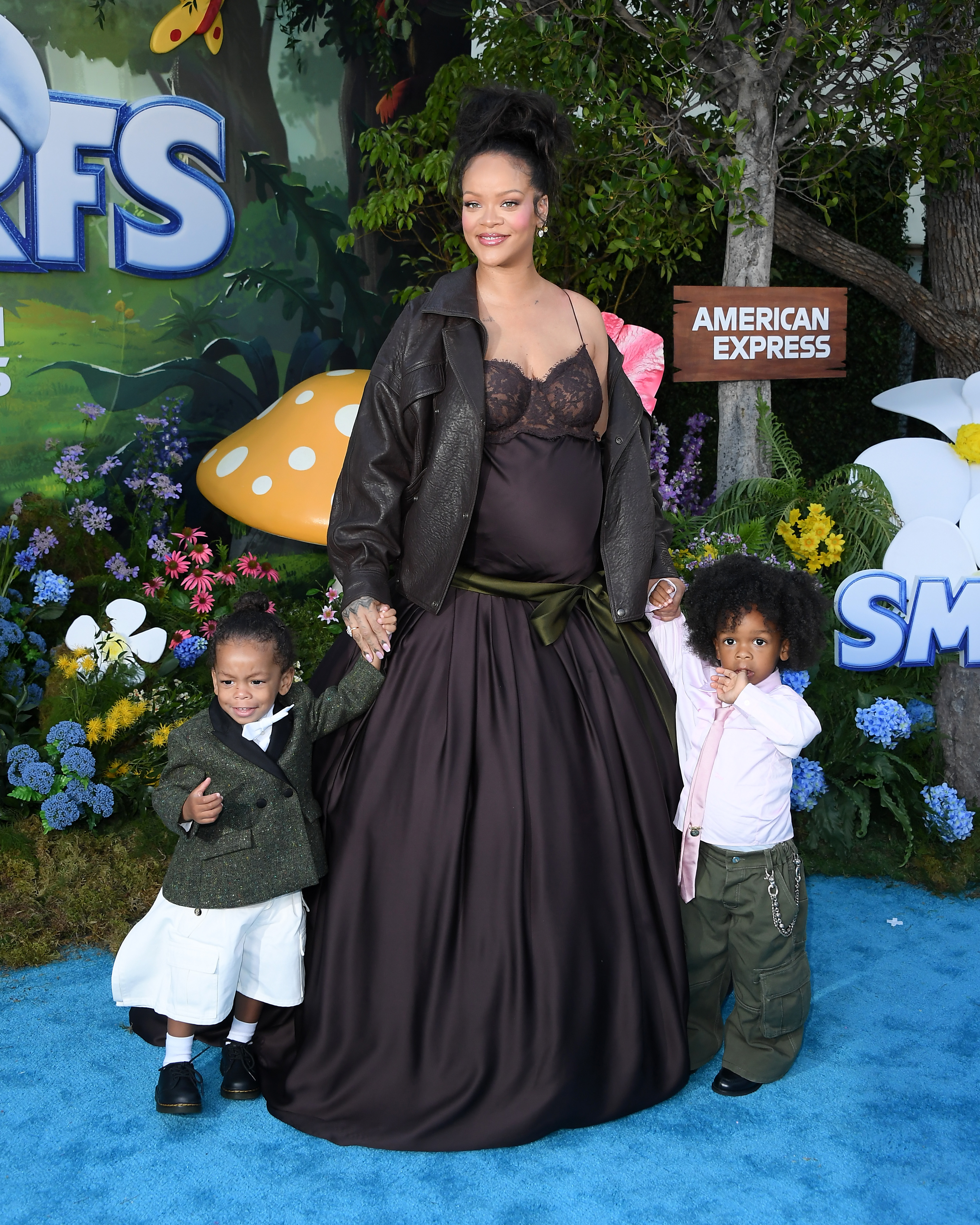 Rihanna photographed with her sons Riot Rose Mayers and RZA Athelston Mayers at the ''Smurfs'' premiere | Source: Getty Images