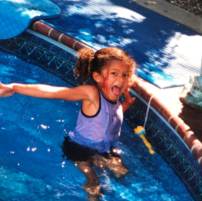 The vibrant personality she developed as she grew up has remained reserved for those closest to her. In this photo, she posed at a pool while making a silly face in a throwback image uploaded on September 2, 2022. | Source: Instagram/zendaya