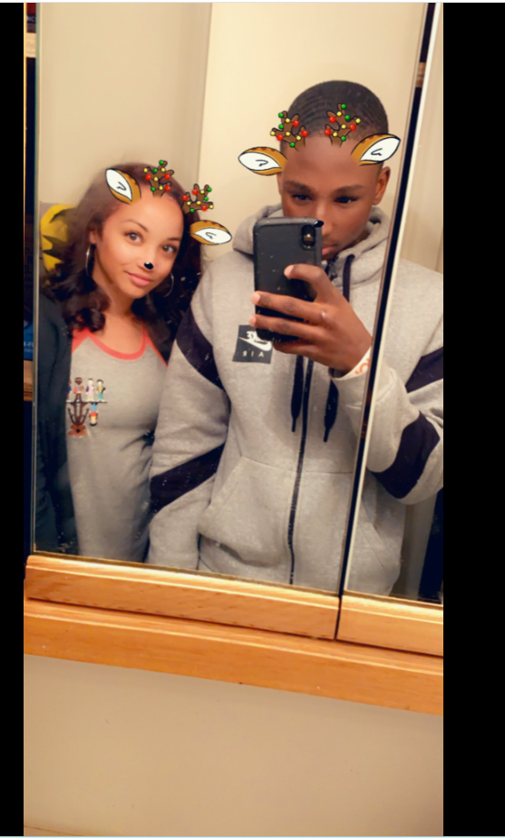 William Davis keeps it lighthearted in a mirror selfie featuring a holiday-themed face filter. | Source: Facebook/Ashley Foster