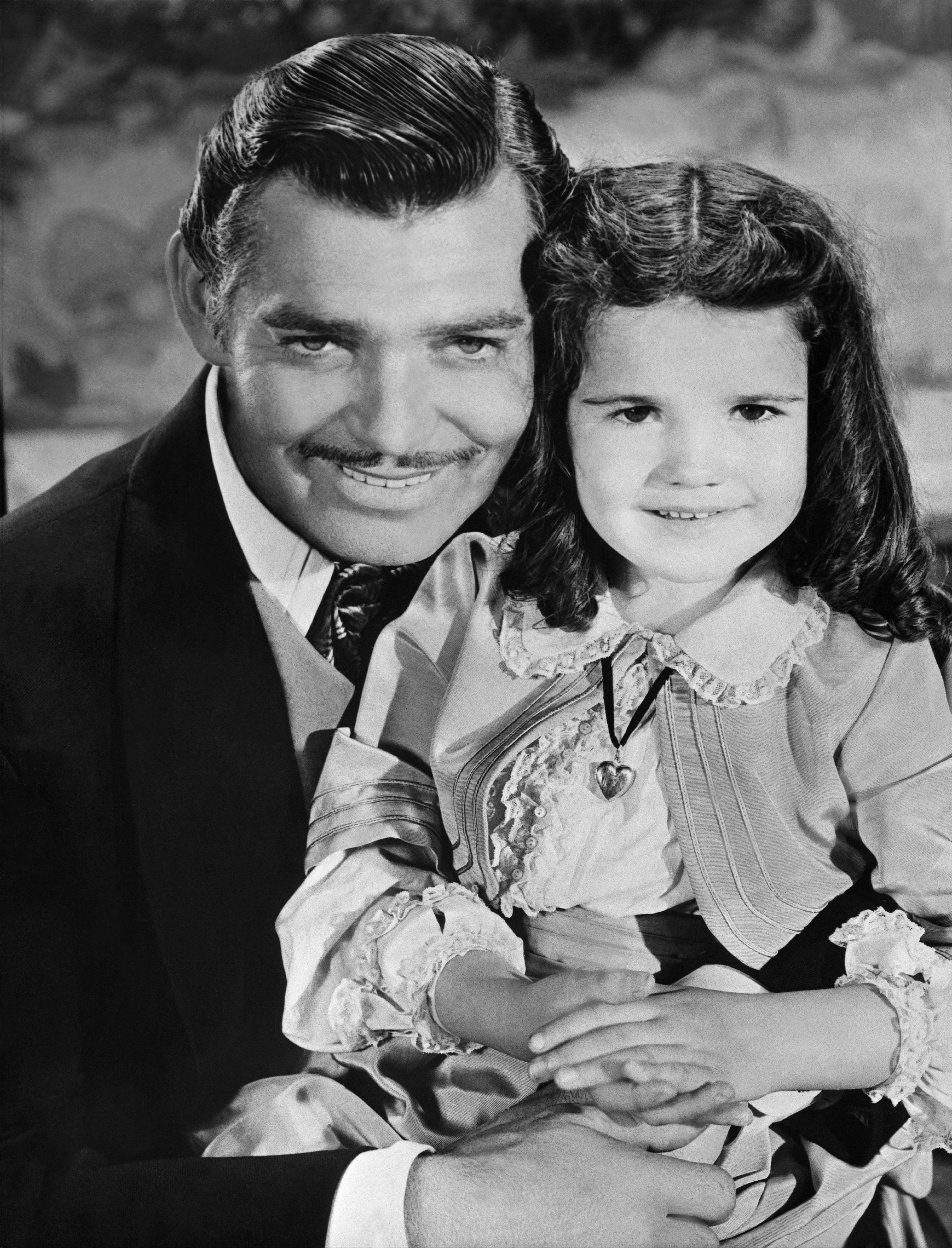 Clark Gable and Cammie King acting in "Gone With the Wind" in 1939. | Source: Getty Images